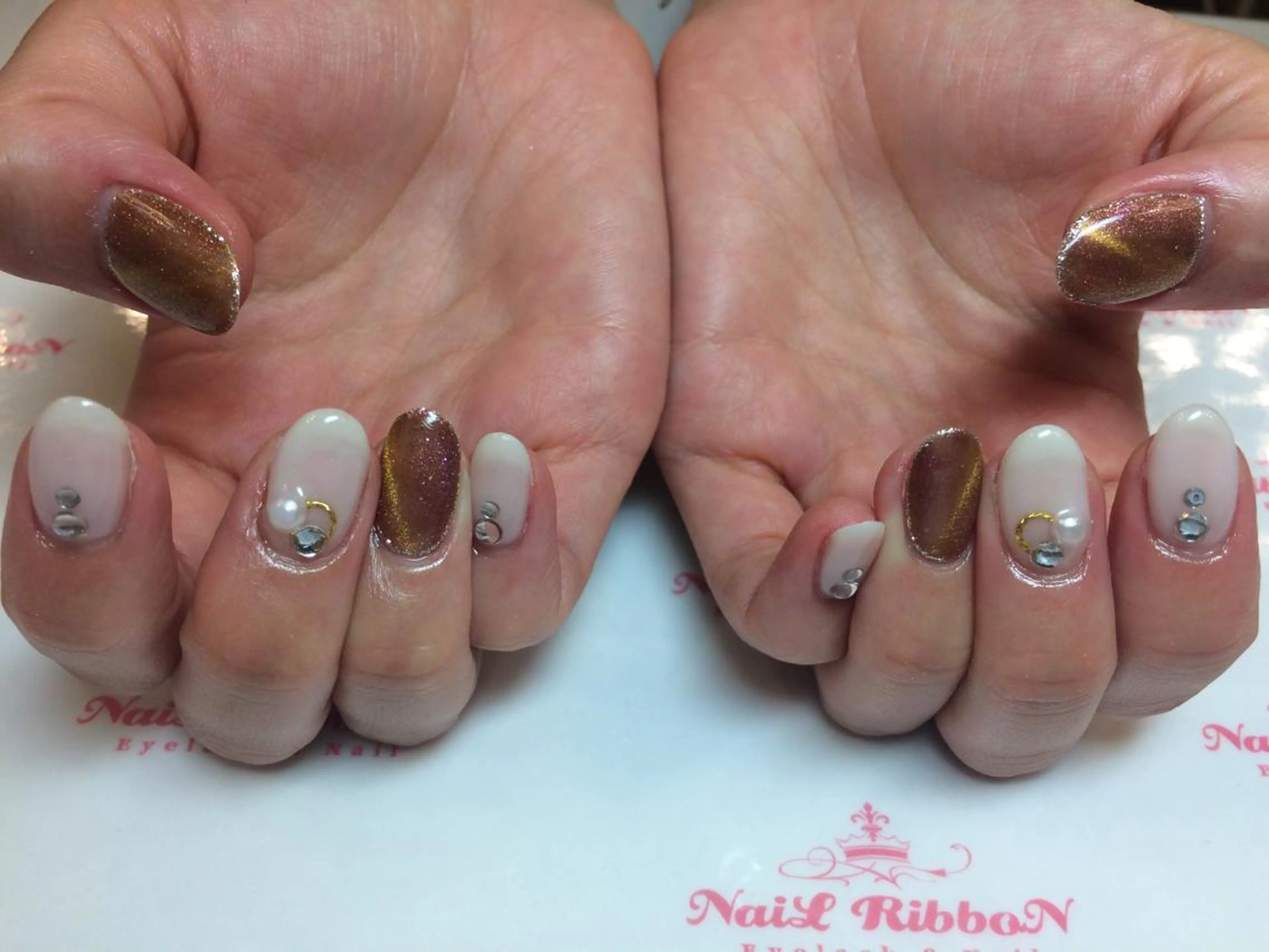 ネイル ネイルリボン 受付スタッフのネイルデザイン