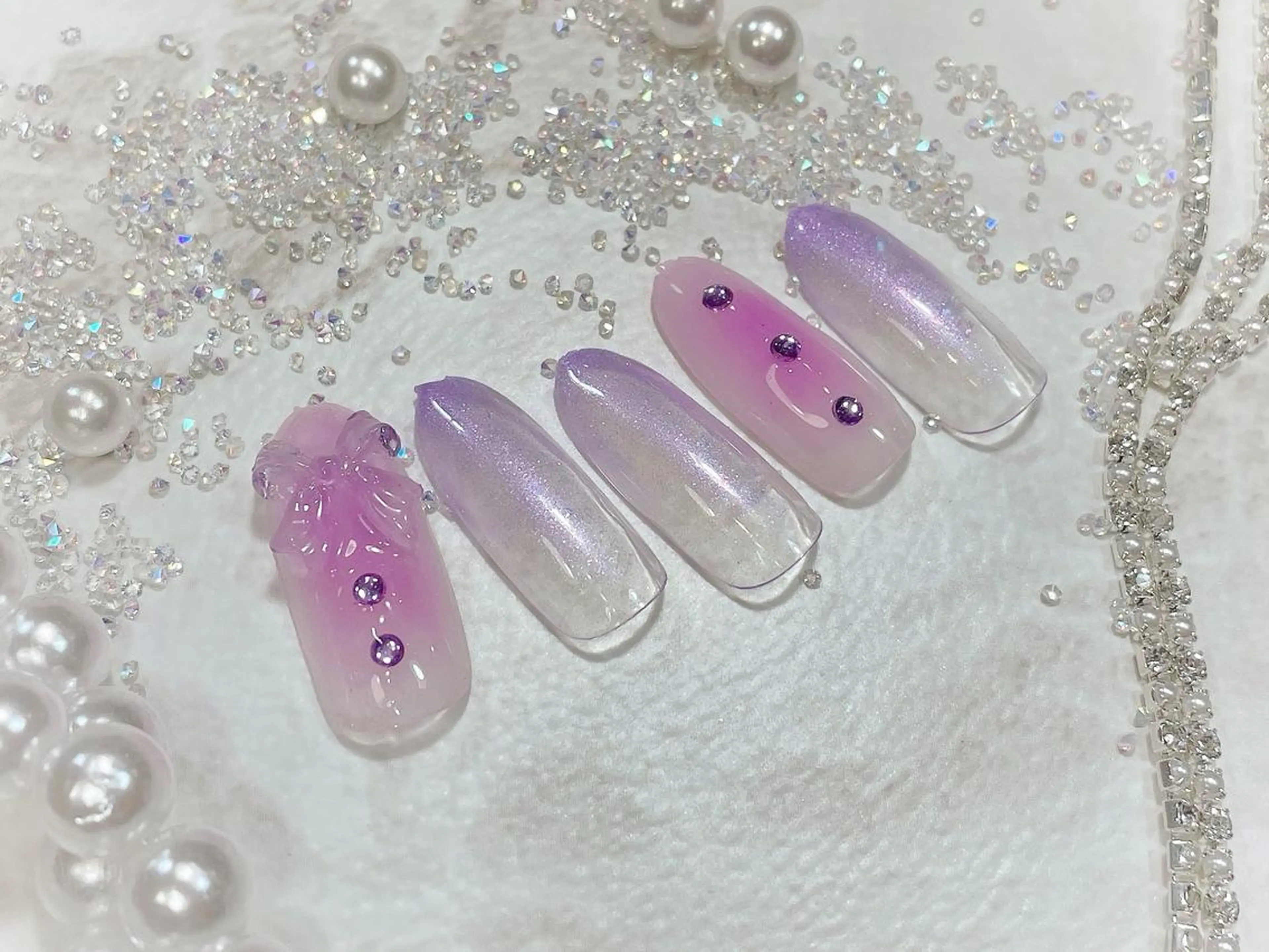 ネイル キラキラネイル ワンホンネイル ハンドネイル Cat's eye TOKYO 新宿店のネイルデザイン