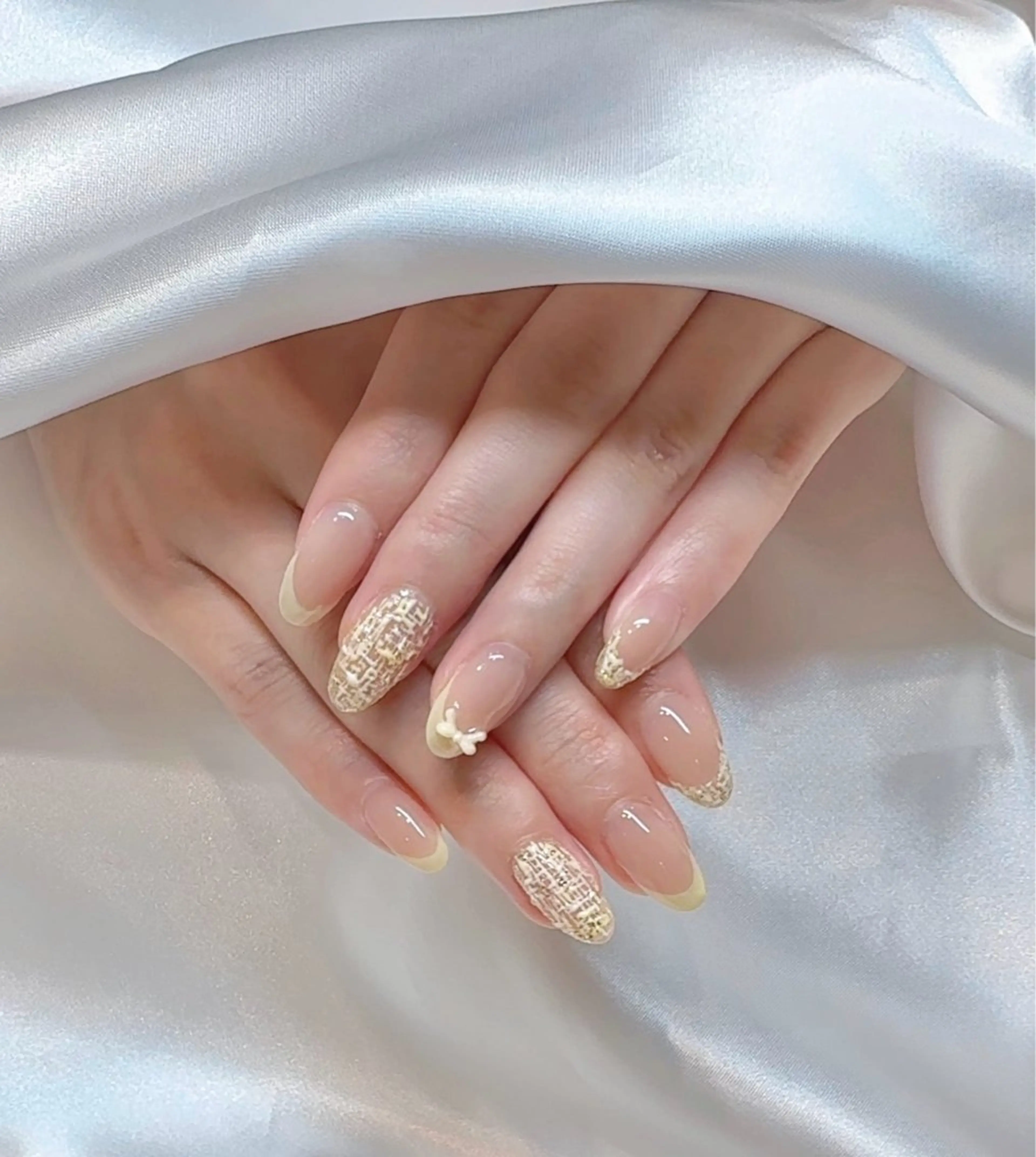 ネイル ツイードネイル 黄色 nail LATTE所属・nail Latteのネイルデザイン