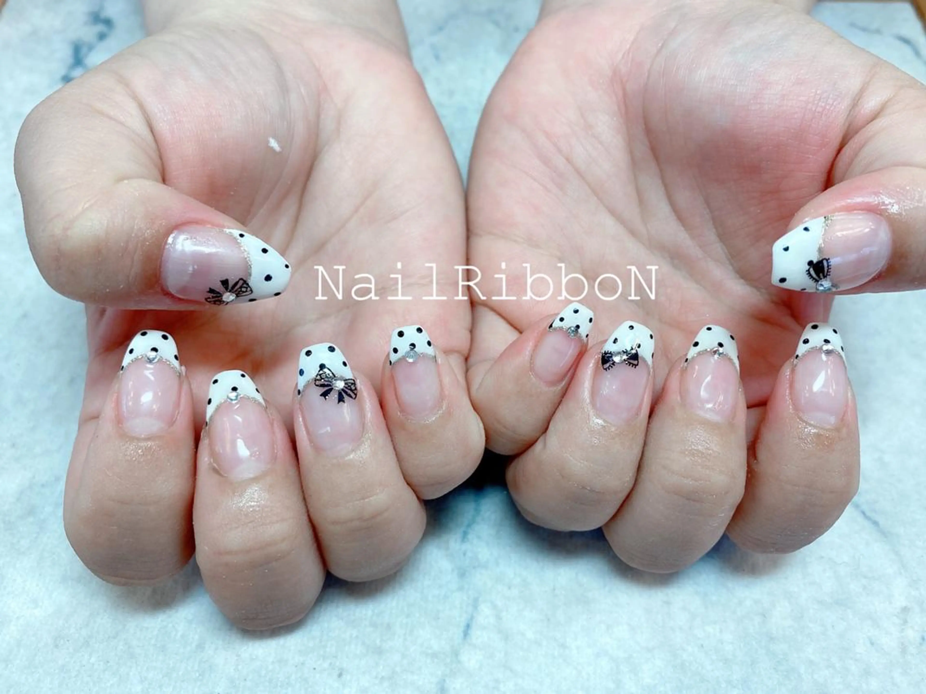 ネイル ネイルリボン 受付スタッフのネイルデザイン