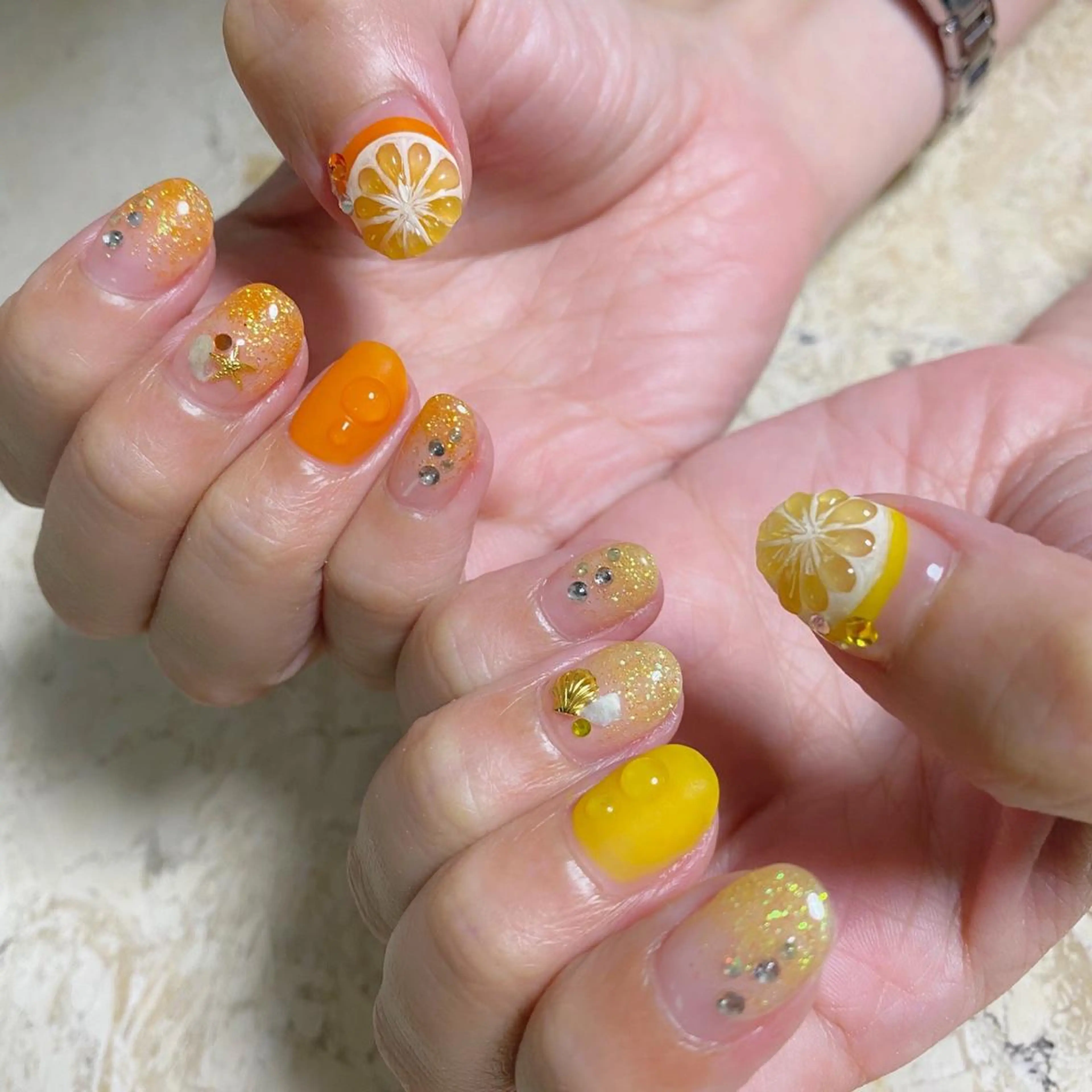 ネイル オレンジ ハンドネイル フットネイル nail salon mieux(ミュー)のマツエク・マツパデザイン