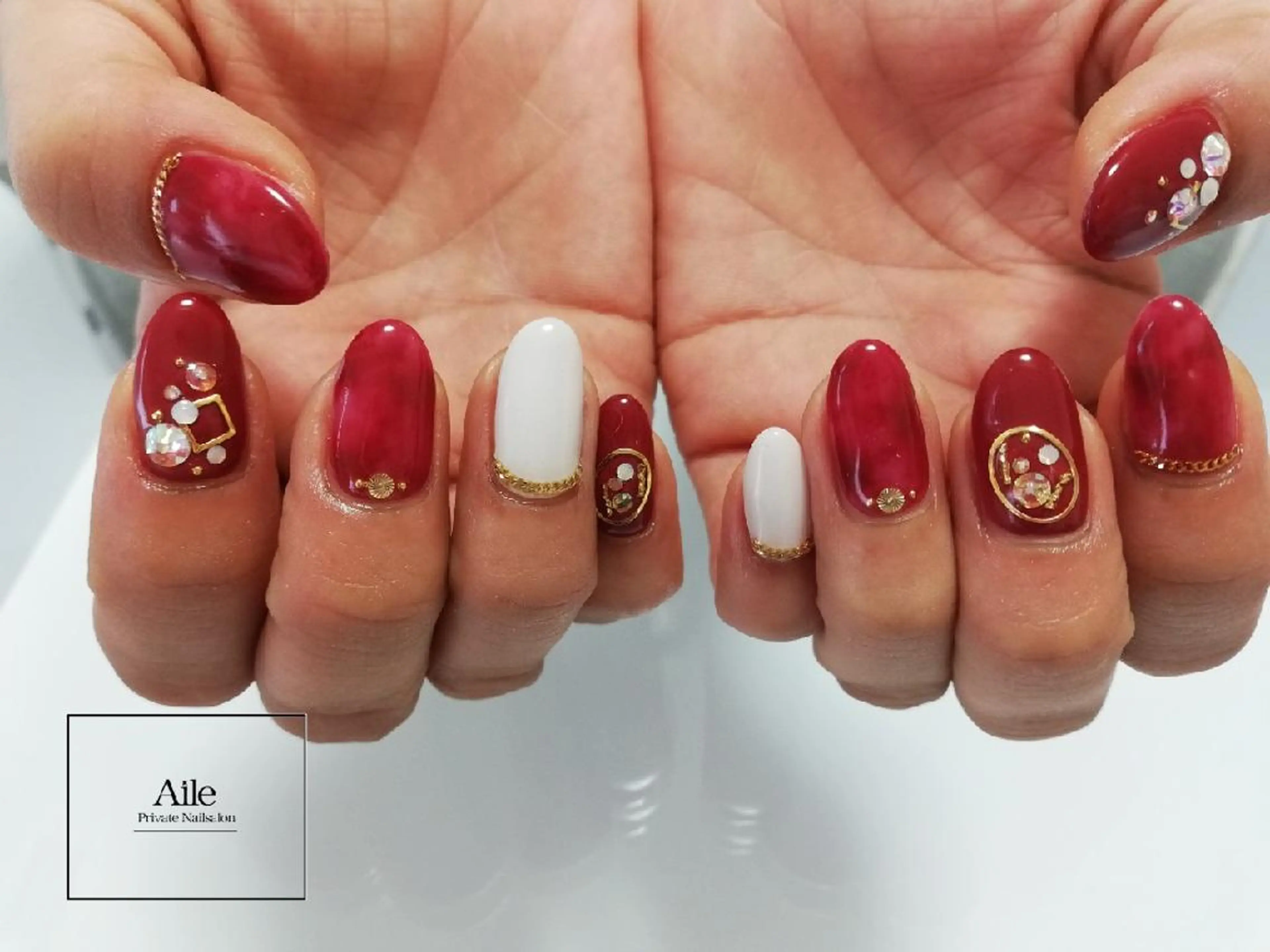 ネイル べっ甲ネイル 赤色 なが さきのネイルデザイン