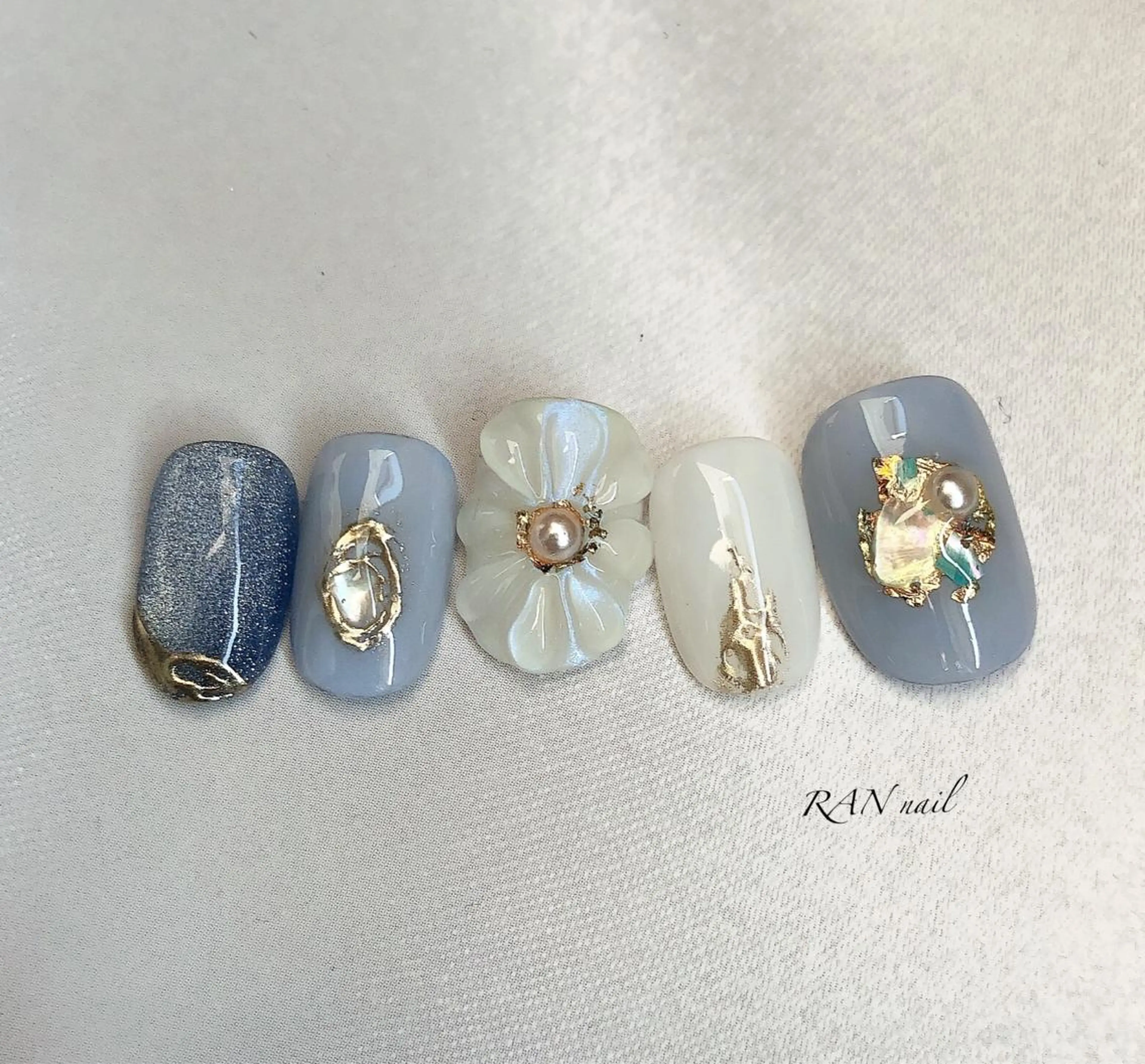ネイル オーロラネイル ブルー 成人式 フラワーネイル ジェルネイル RAN nailのネイルデザイン