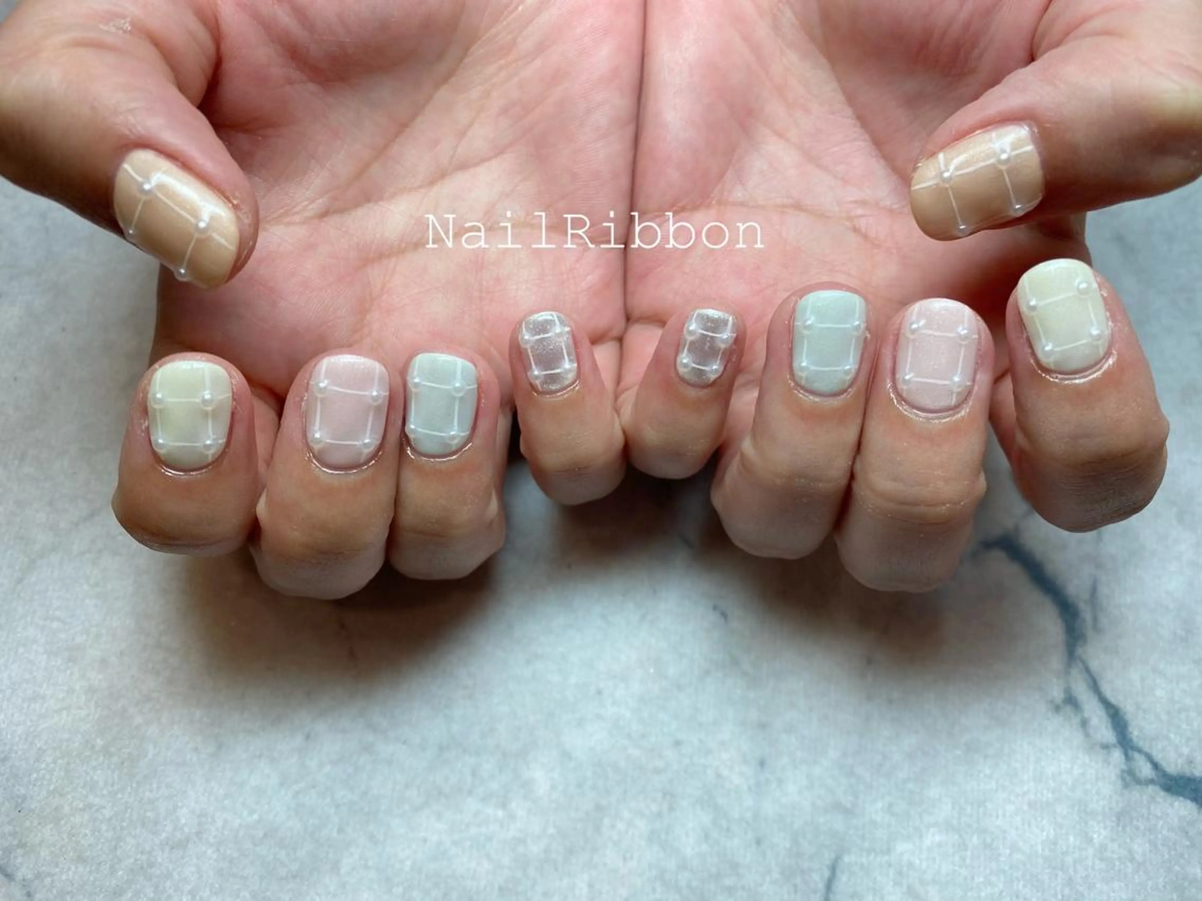 ネイル ネイルリボン 受付スタッフのネイルデザイン