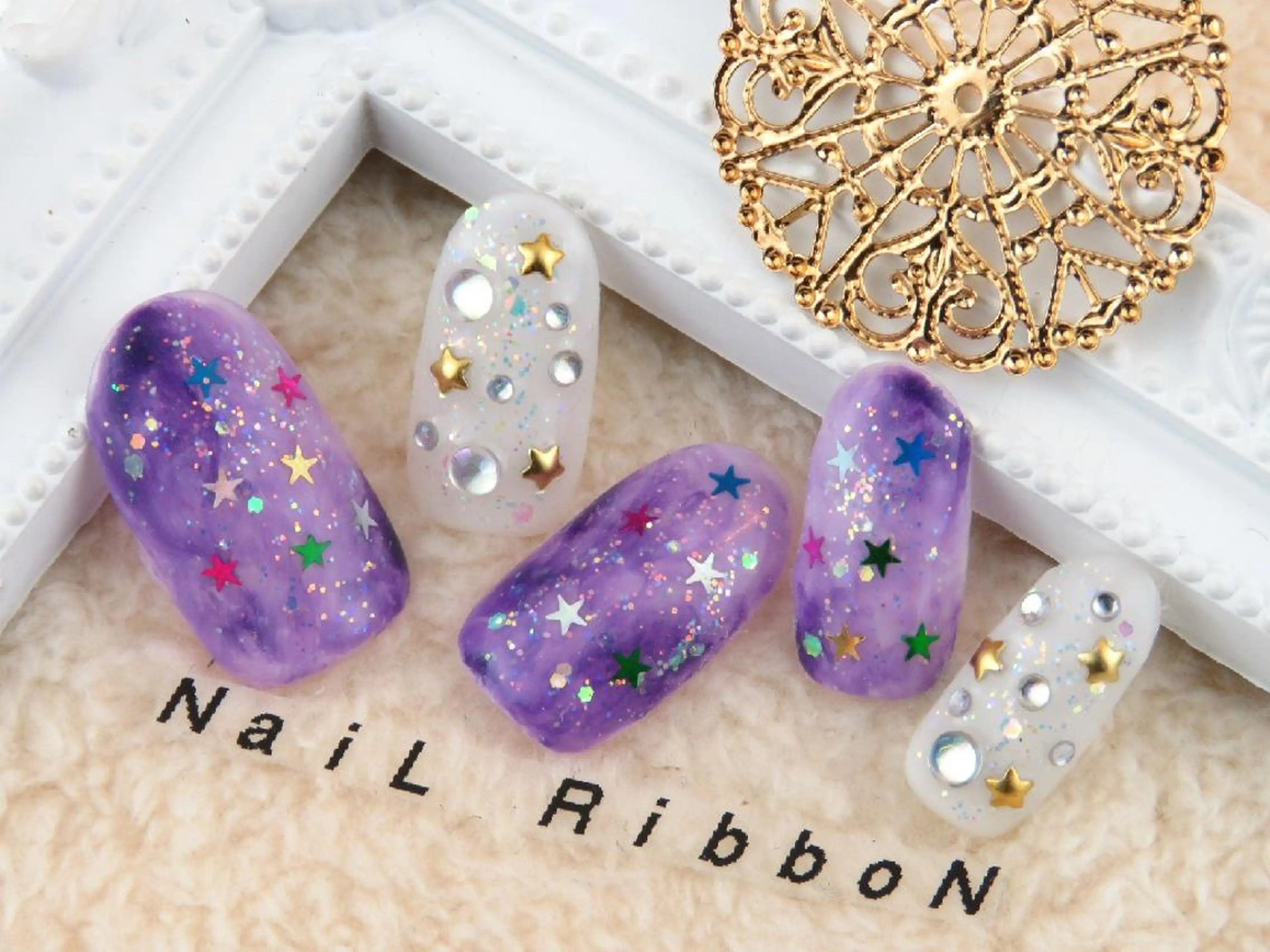 ネイル ネイルリボン 受付スタッフのネイルデザイン