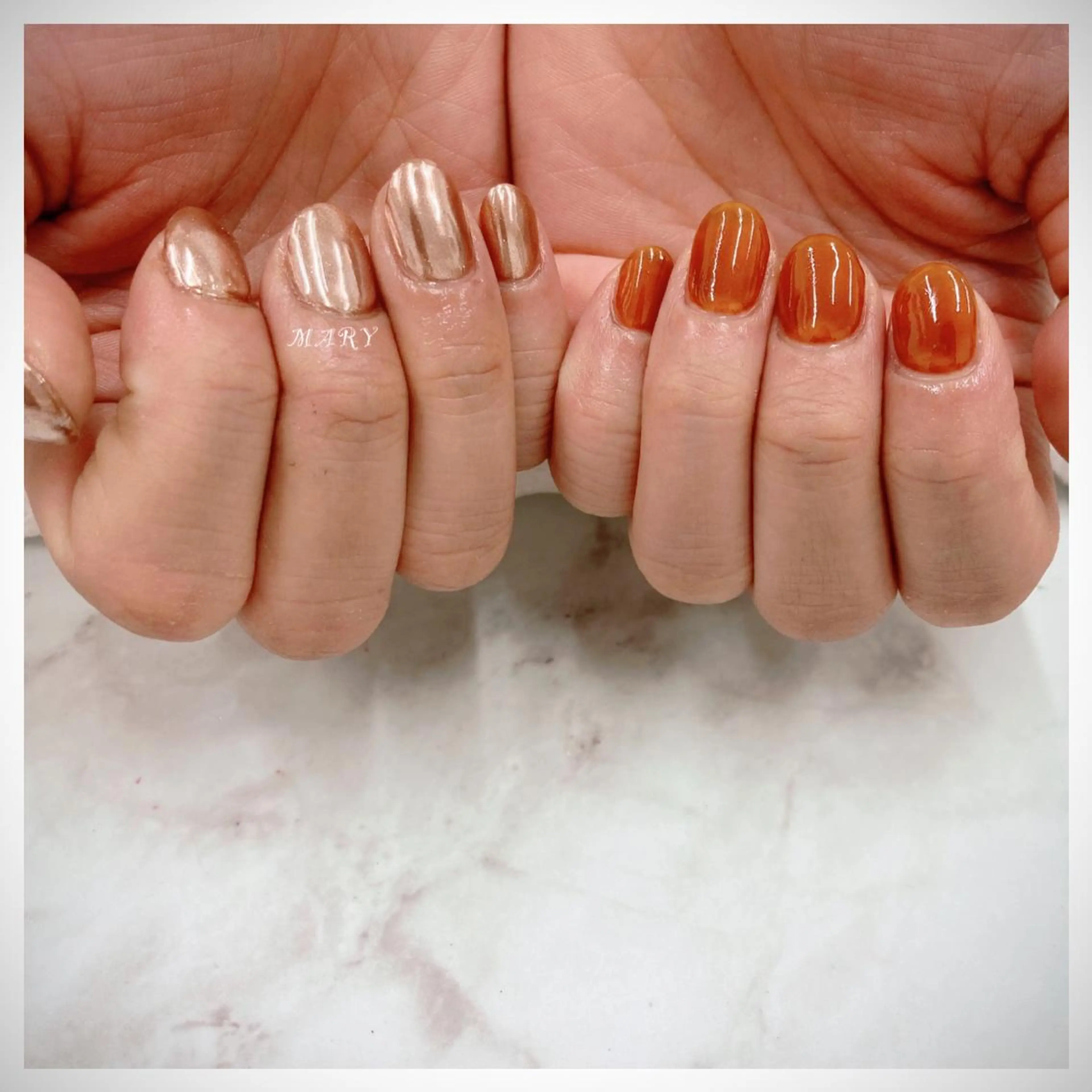 ネイル ミラーネイル ニュアンスネイル ワンカラーネイル オレンジ ハンドネイル Mary nail .narumiのネイルデザイン