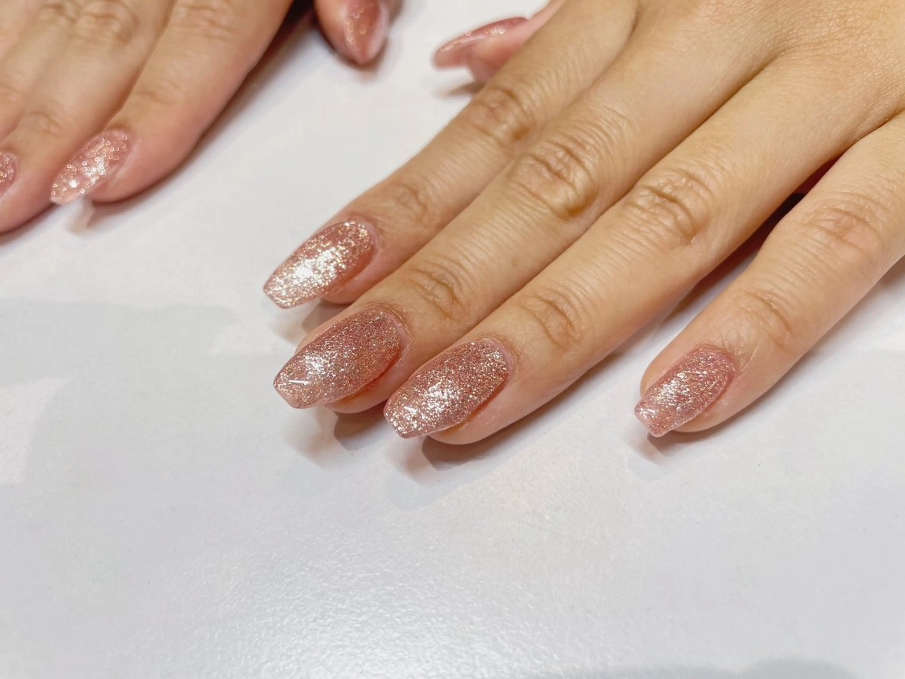 ネイル ラメ(グリッター) ワンカラーネイル ピンク 小林みお @ibelu京橋店のネイルデザイン