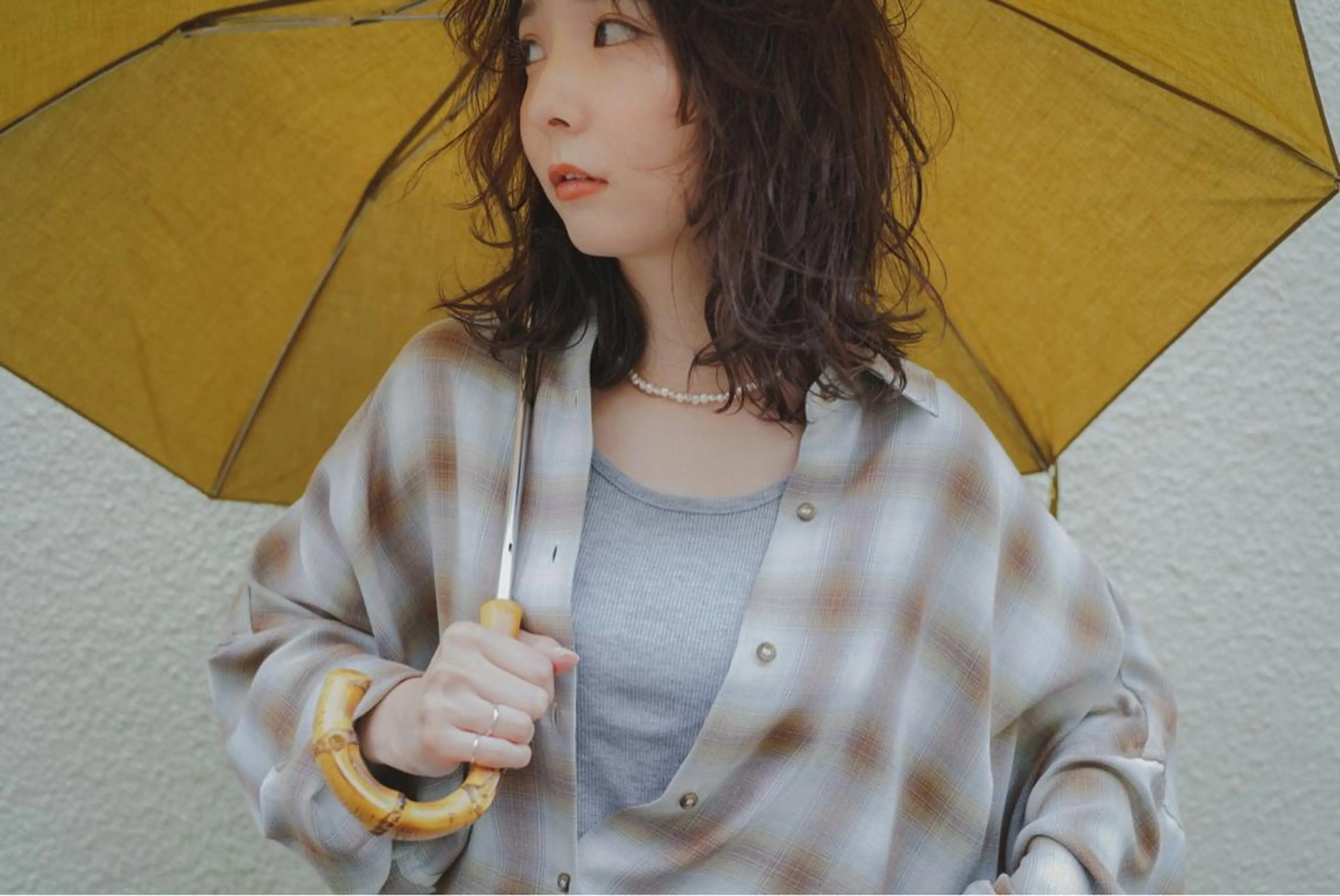 ミディアム パーマ 切りっぱなしボブ ミディアムパーマ ボブ くせ毛 レイヤーカット Spiel所属・Spiel KOMOのヘアスタイル