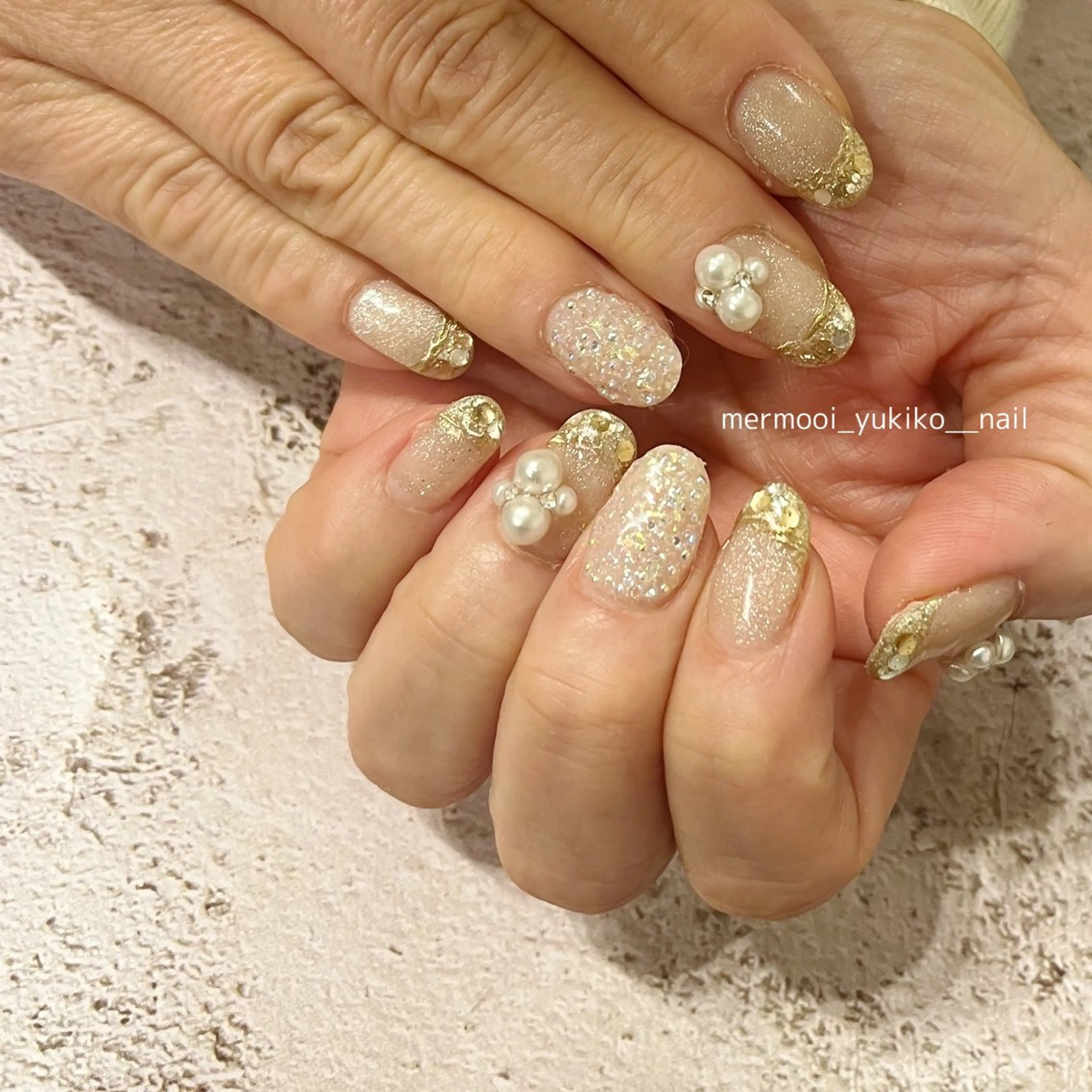 ネイル フレンチネイル ジェルネイル ガラスフレンチ ゴールド キラキラネイル melumooi nailのネイルデザイン