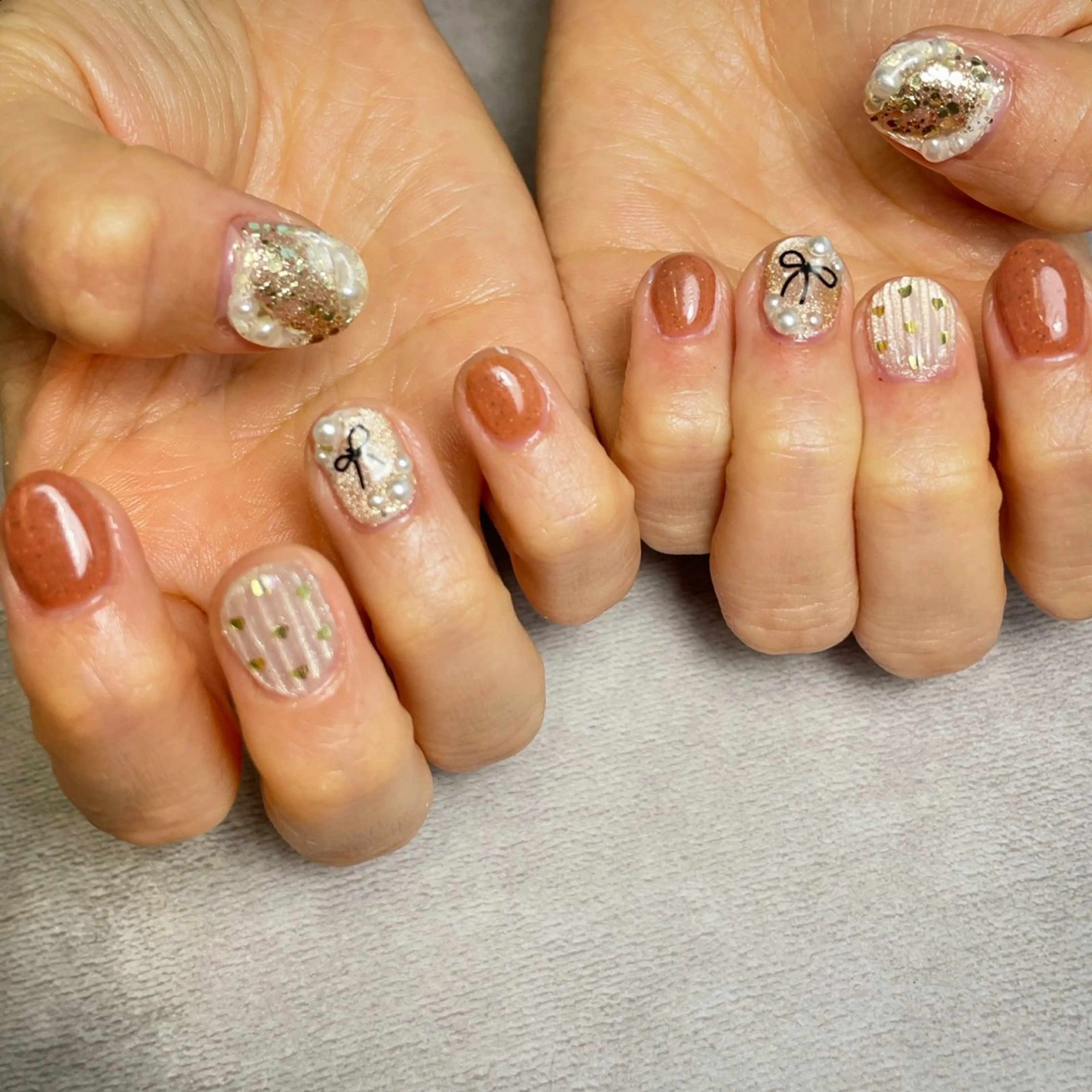 ネイル ハート オレンジ リボン K Harukaのネイルデザイン