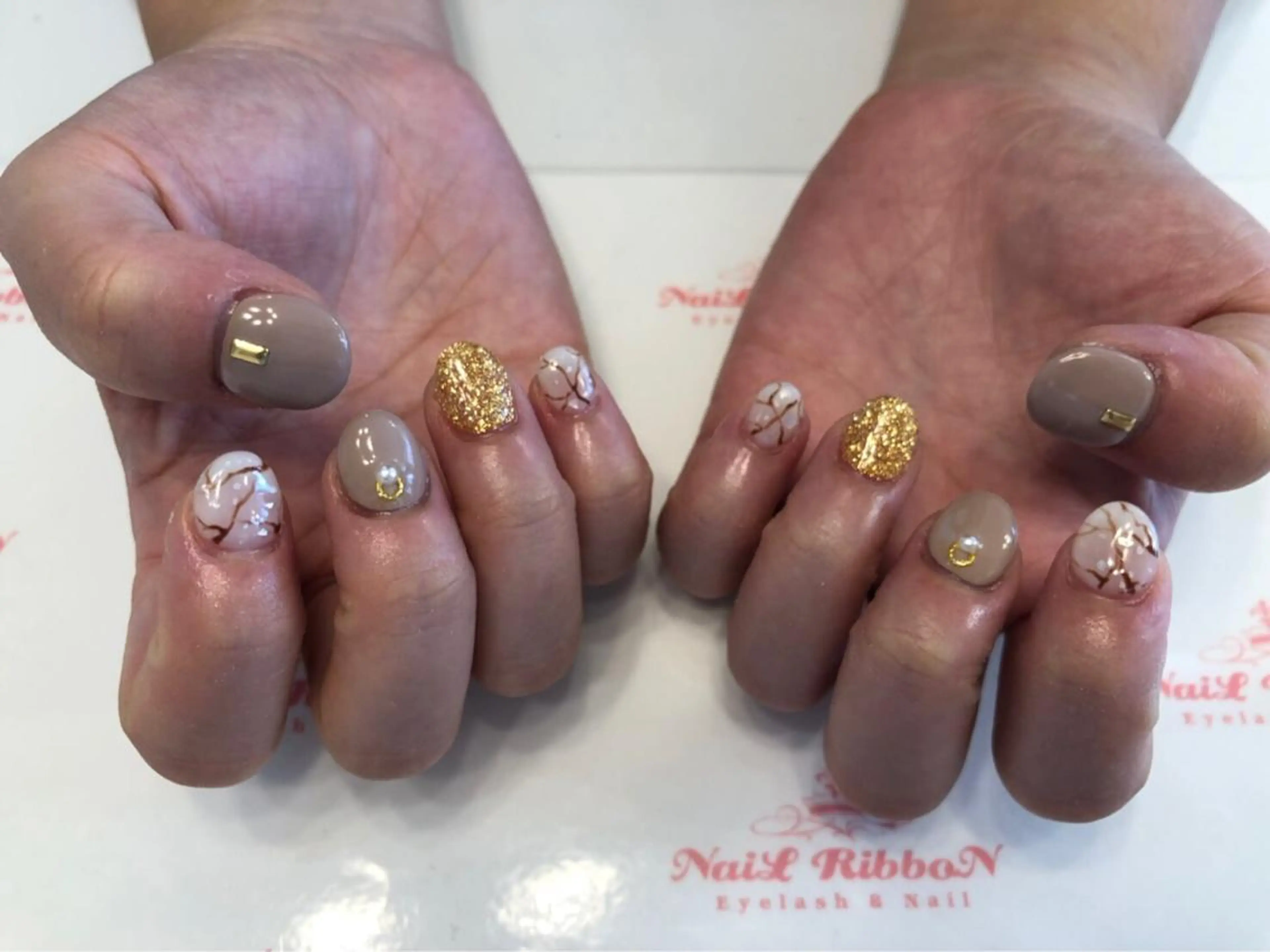 ネイル 春ネイル ネイルリボン 受付スタッフのネイルデザイン