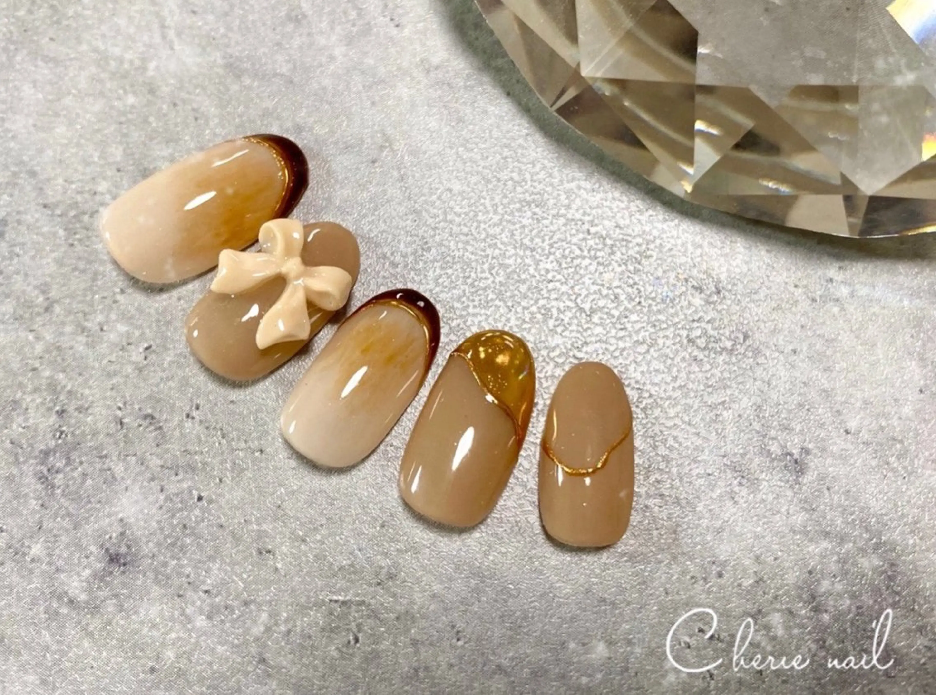 ネイル ブラウン ジェルネイル リボン ハンドネイル Cherienail yunaのネイルデザイン