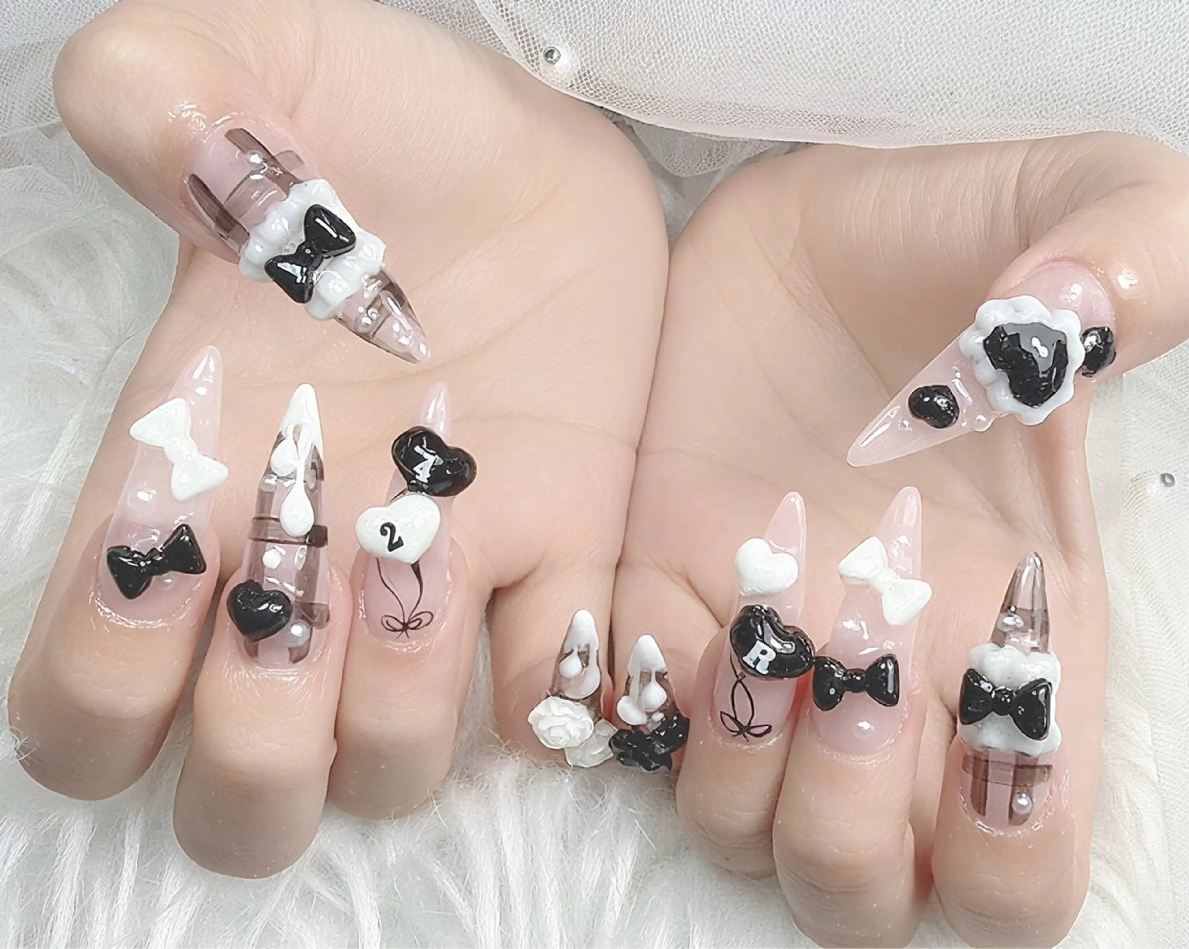 ネイル ハート リボン ハンドネイル ハンドケア Gote Kawa nail salonのネイルデザイン