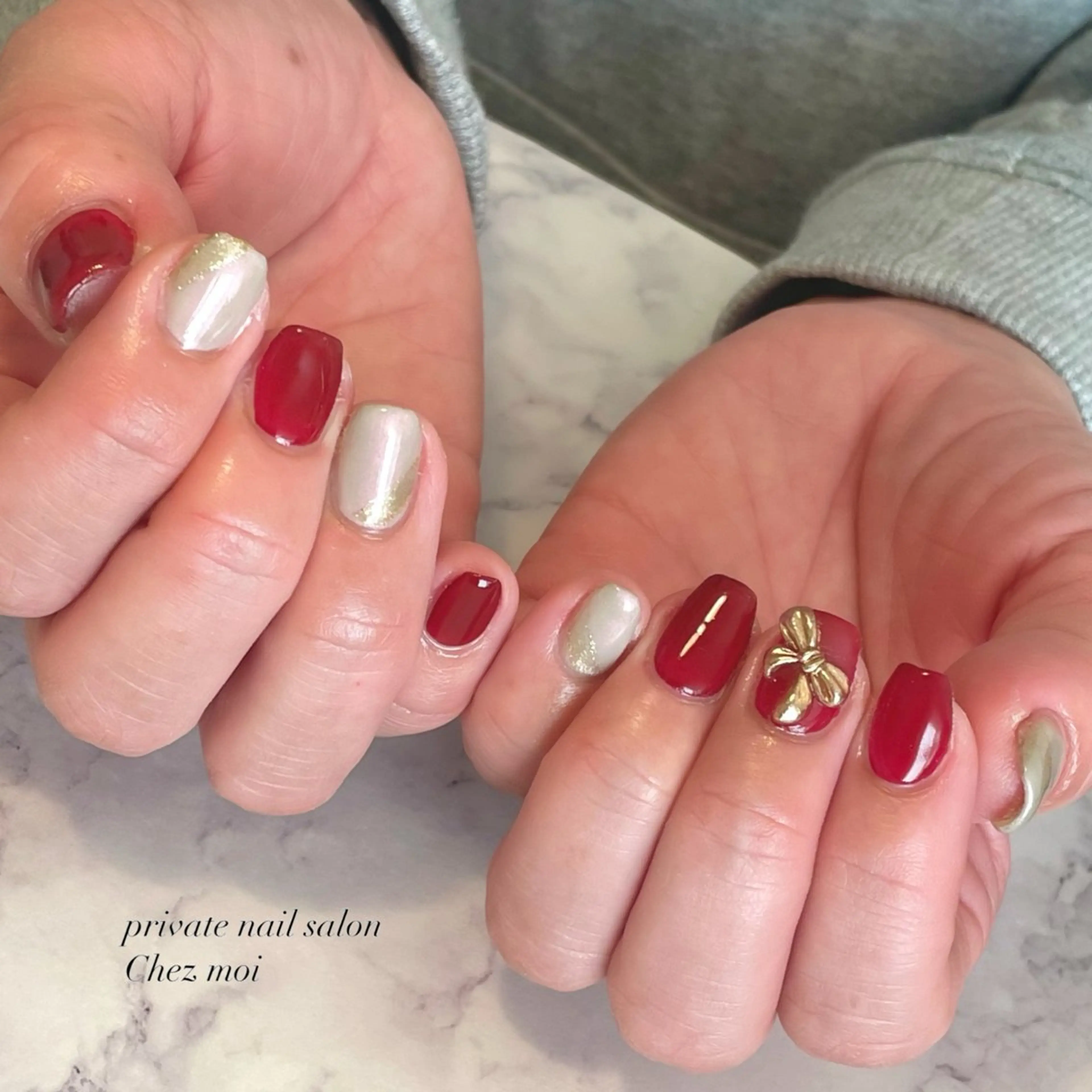 ネイル フラワーネイル ゴールド リボン KOMINE TOMOKOのネイルデザイン