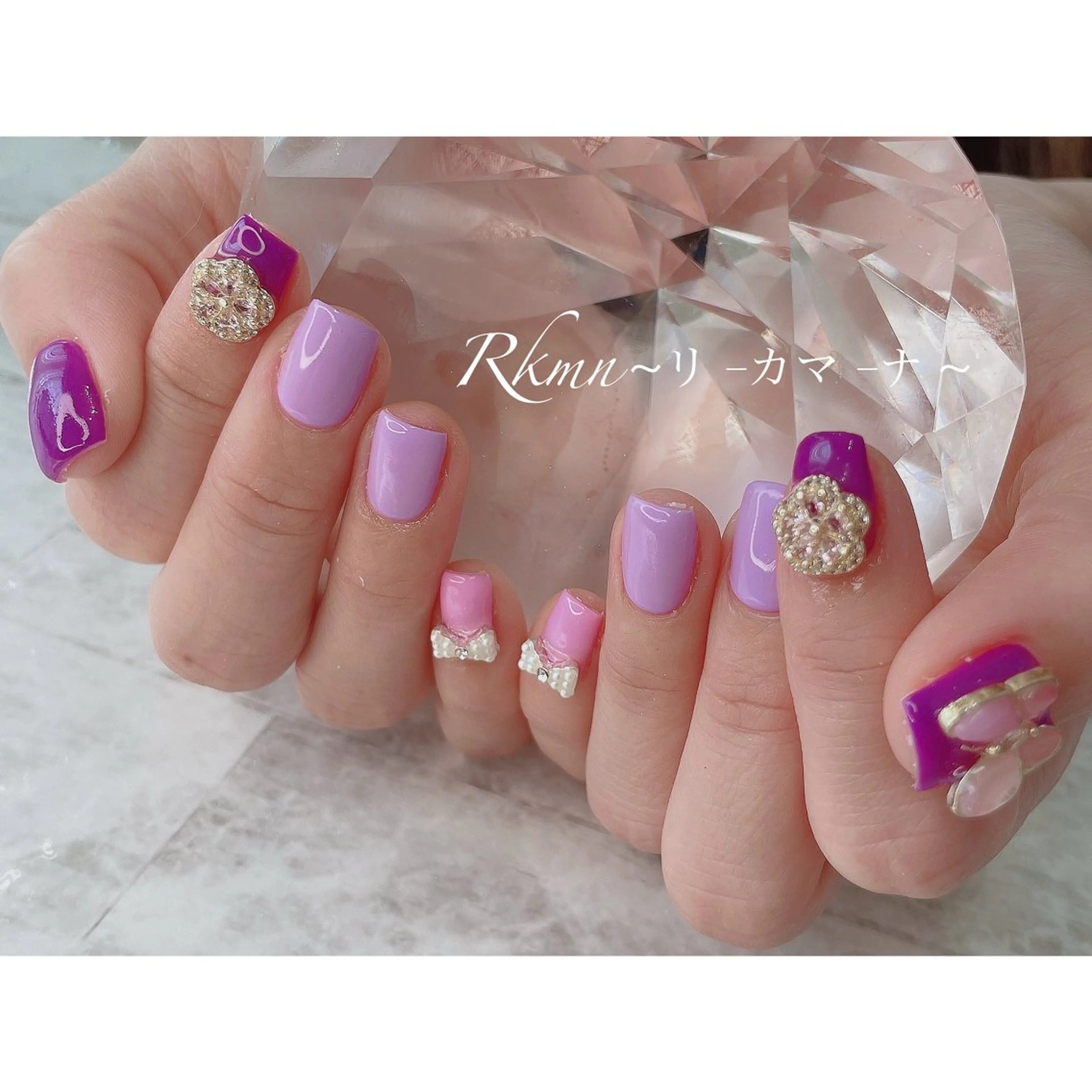 ネイル アートネイル フラワーネイル パープル リボン 春ネイル ハンドネイル フットネイル ハンドケア Rkmn ~リ-カマ-ナ~のネイルデザイン