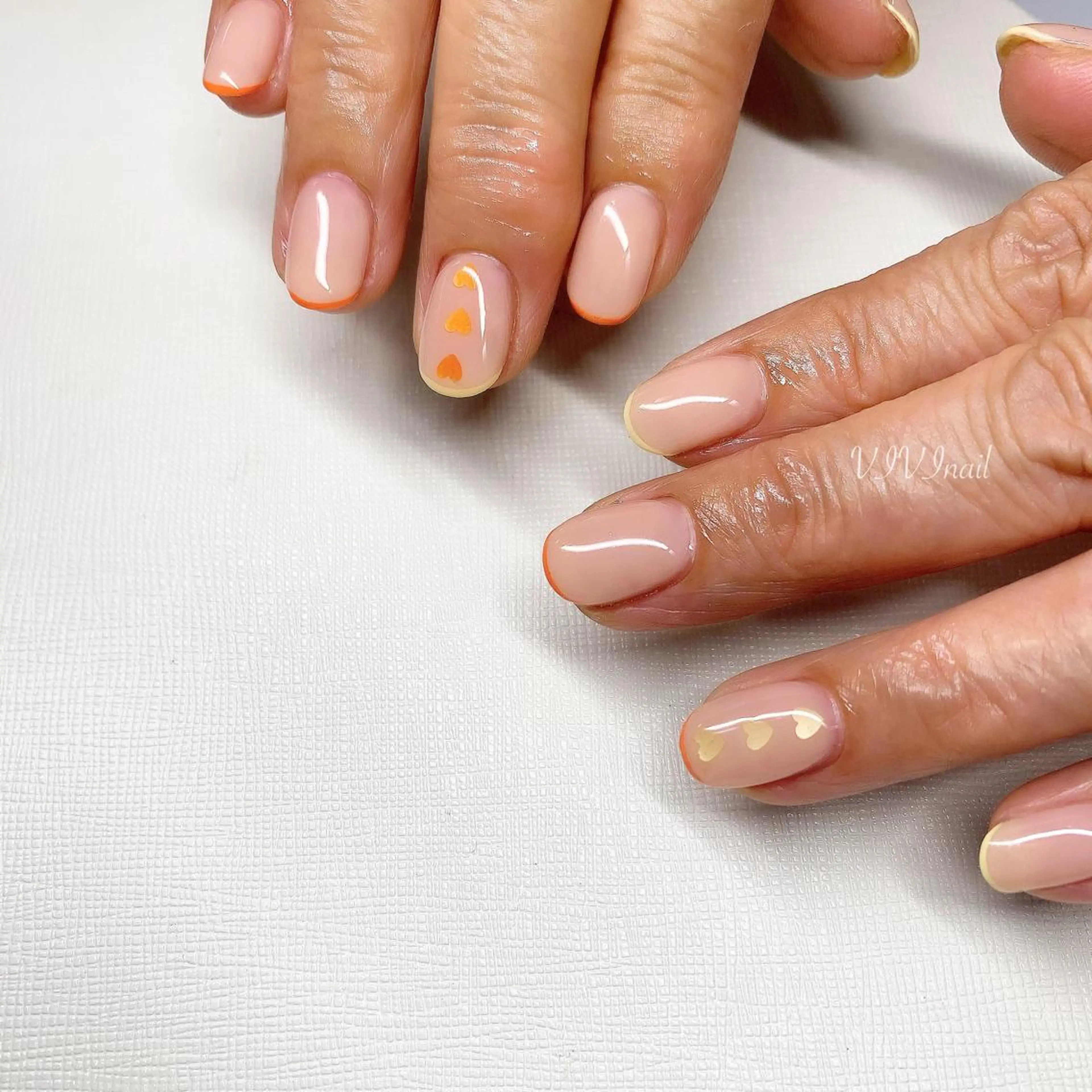 ネイル フレンチネイル オレンジ 黄色 ハンドネイル vivi nailのネイルデザイン