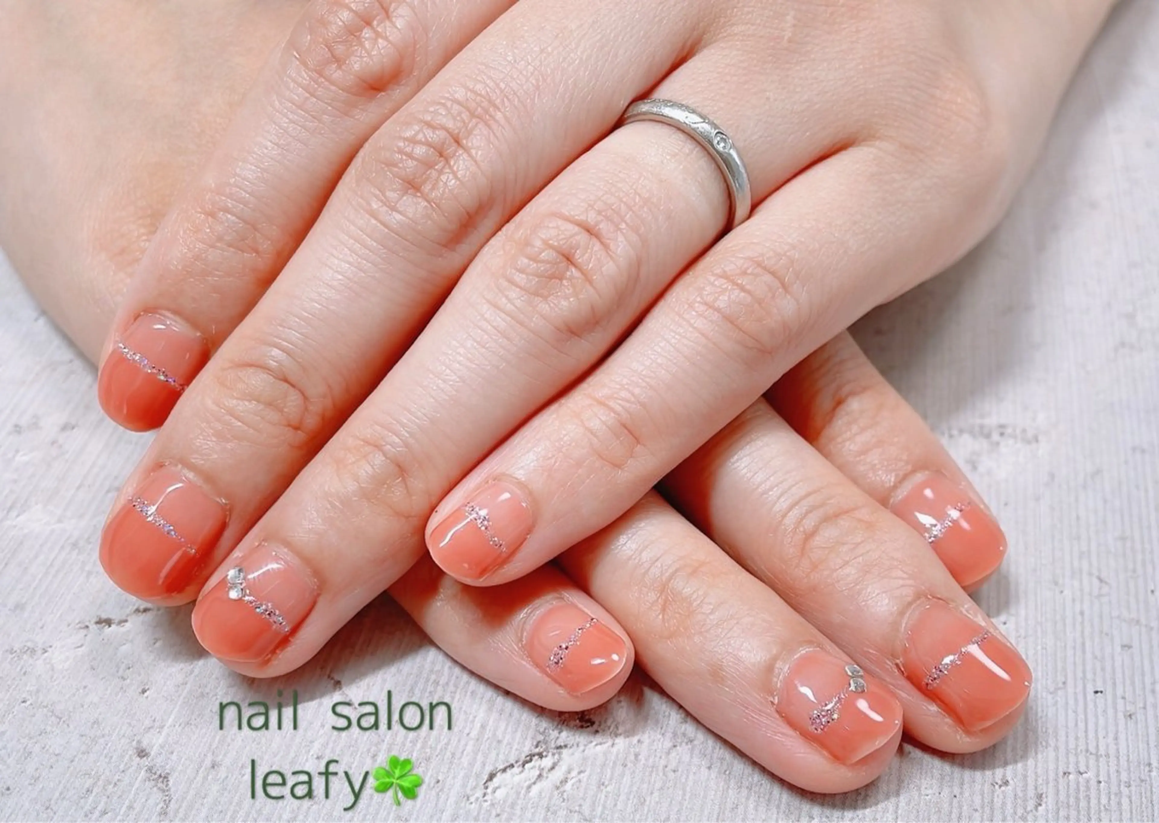 ネイル ラメ(グリッター) オレンジ シンプルネイル ストーンネイル ネイルサロン leafyのネイルデザイン