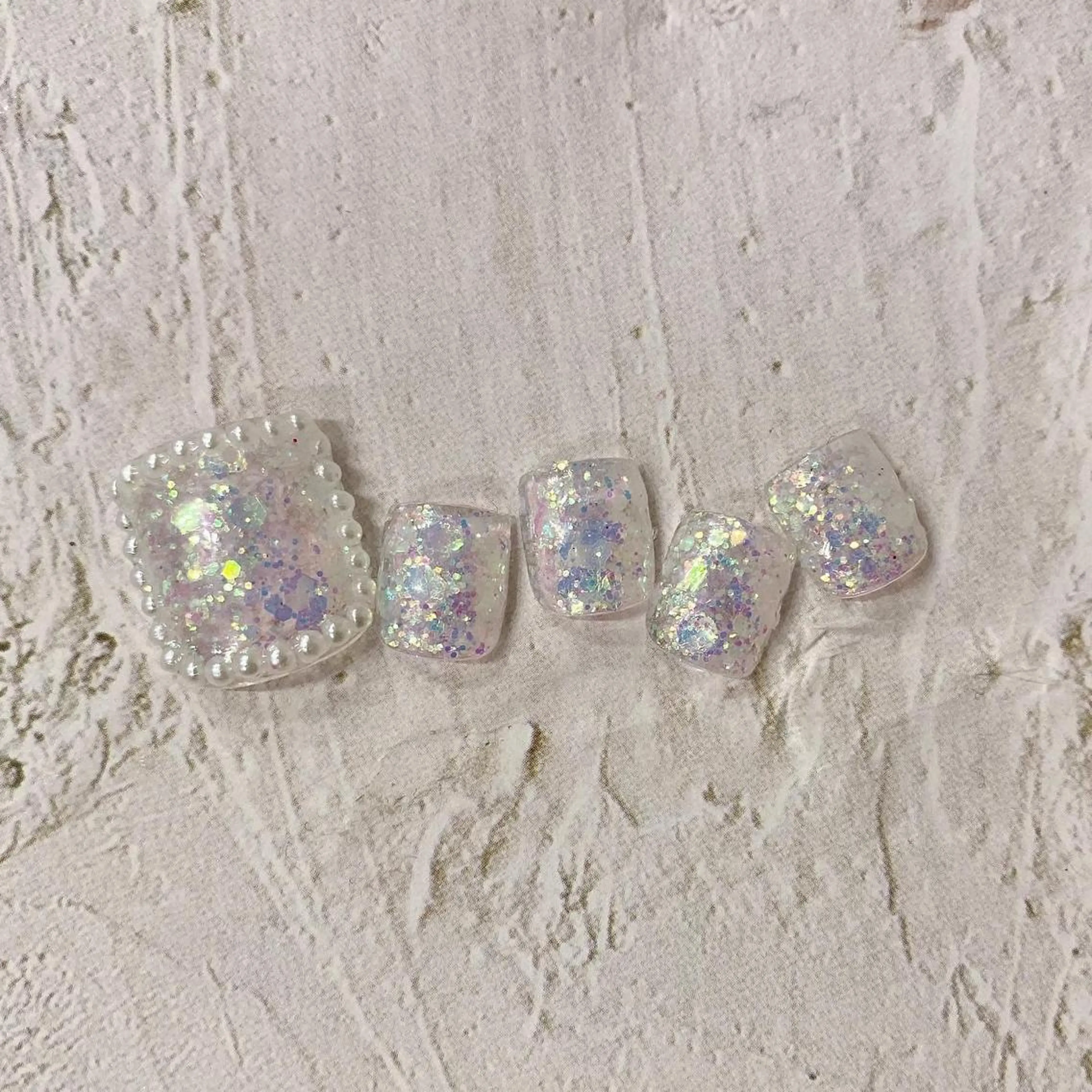 ネイル オーロラネイル フットネイル キラキラネイル 韓国ネイル 大理石ネイル(マーブル) melumooi nailのネイルデザイン