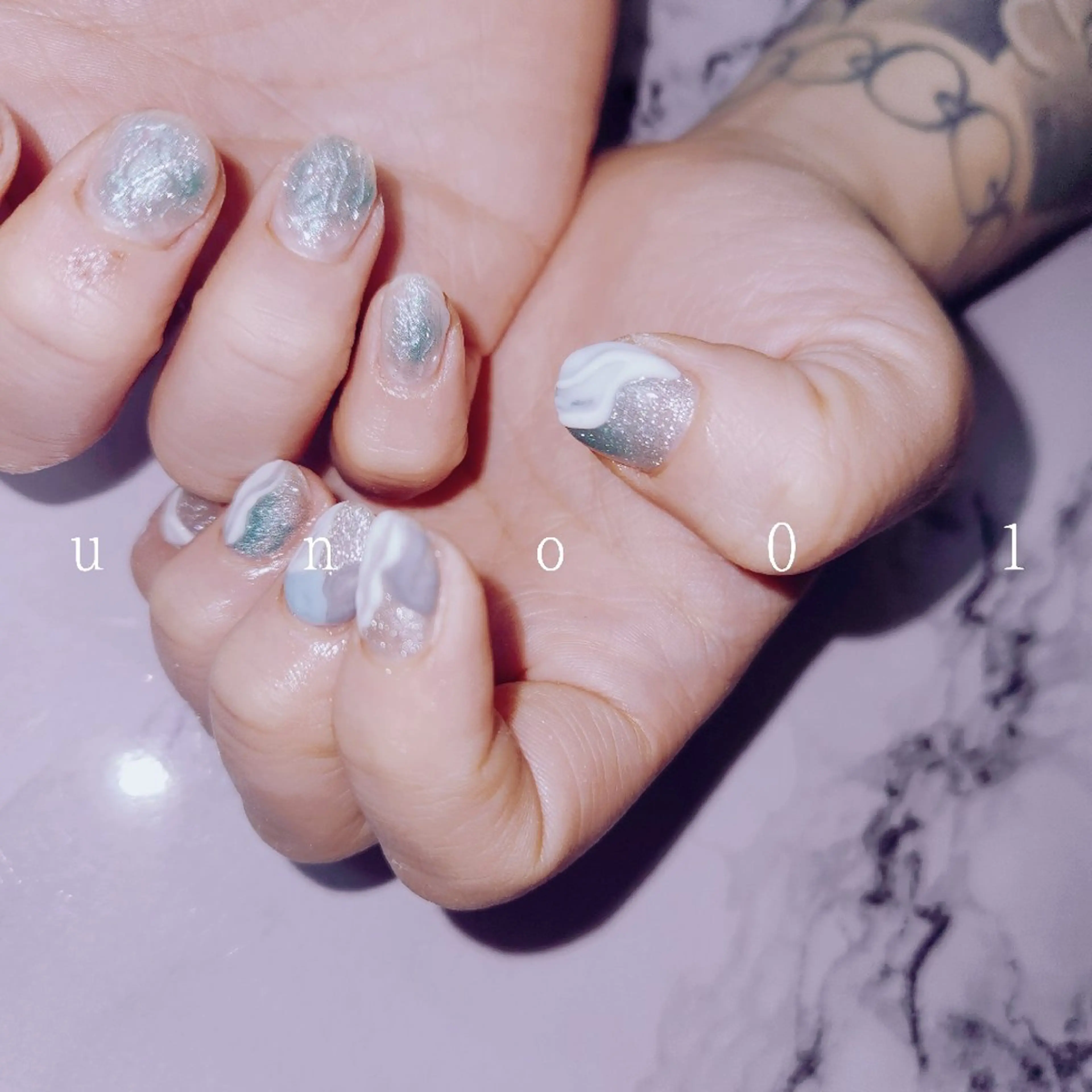 ネイル 梅田🦄中崎町🩵 u n o 0 1のネイルデザイン