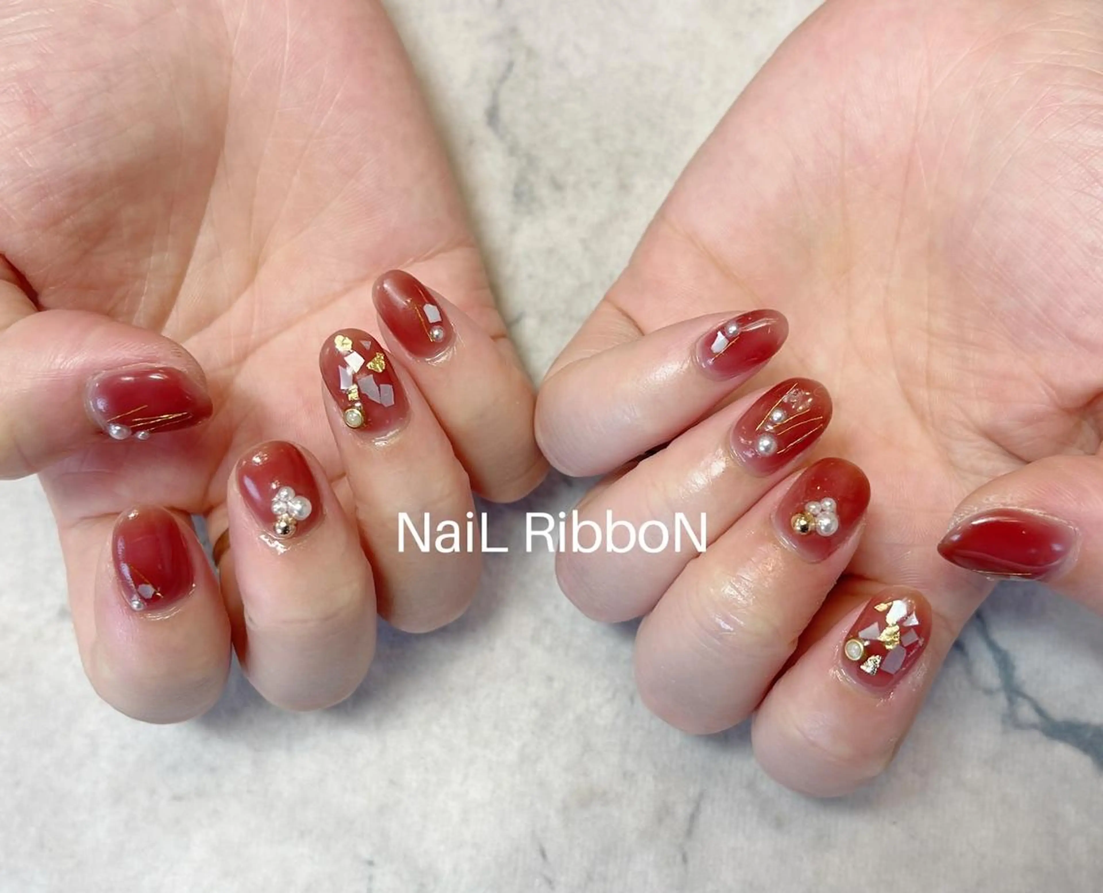 ネイル ネイルリボン 受付スタッフのネイルデザイン