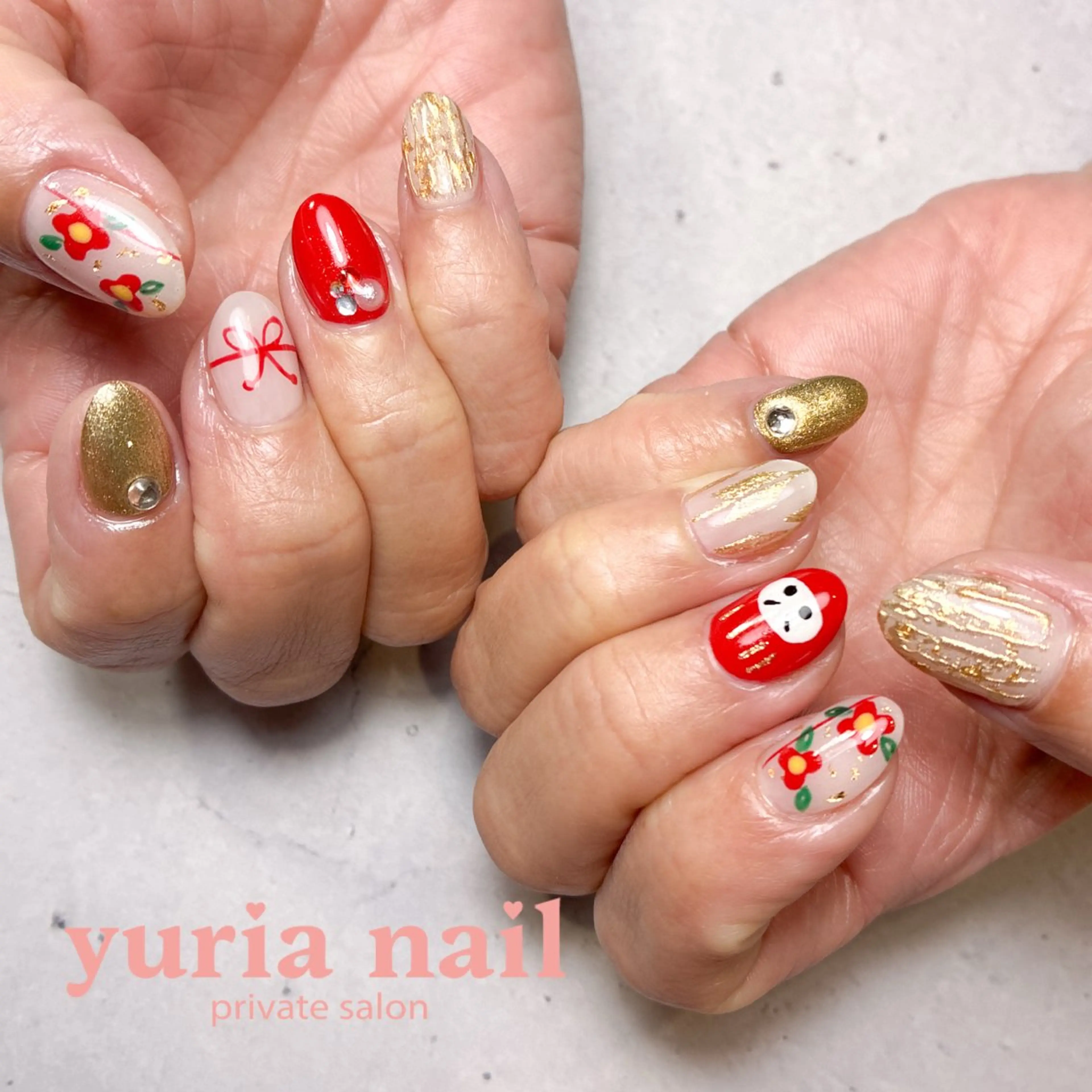 ネイル アートネイル ジェルネイル ゴールド 赤色 リボン ハンドネイル 小林 ゆりあのネイルデザイン
