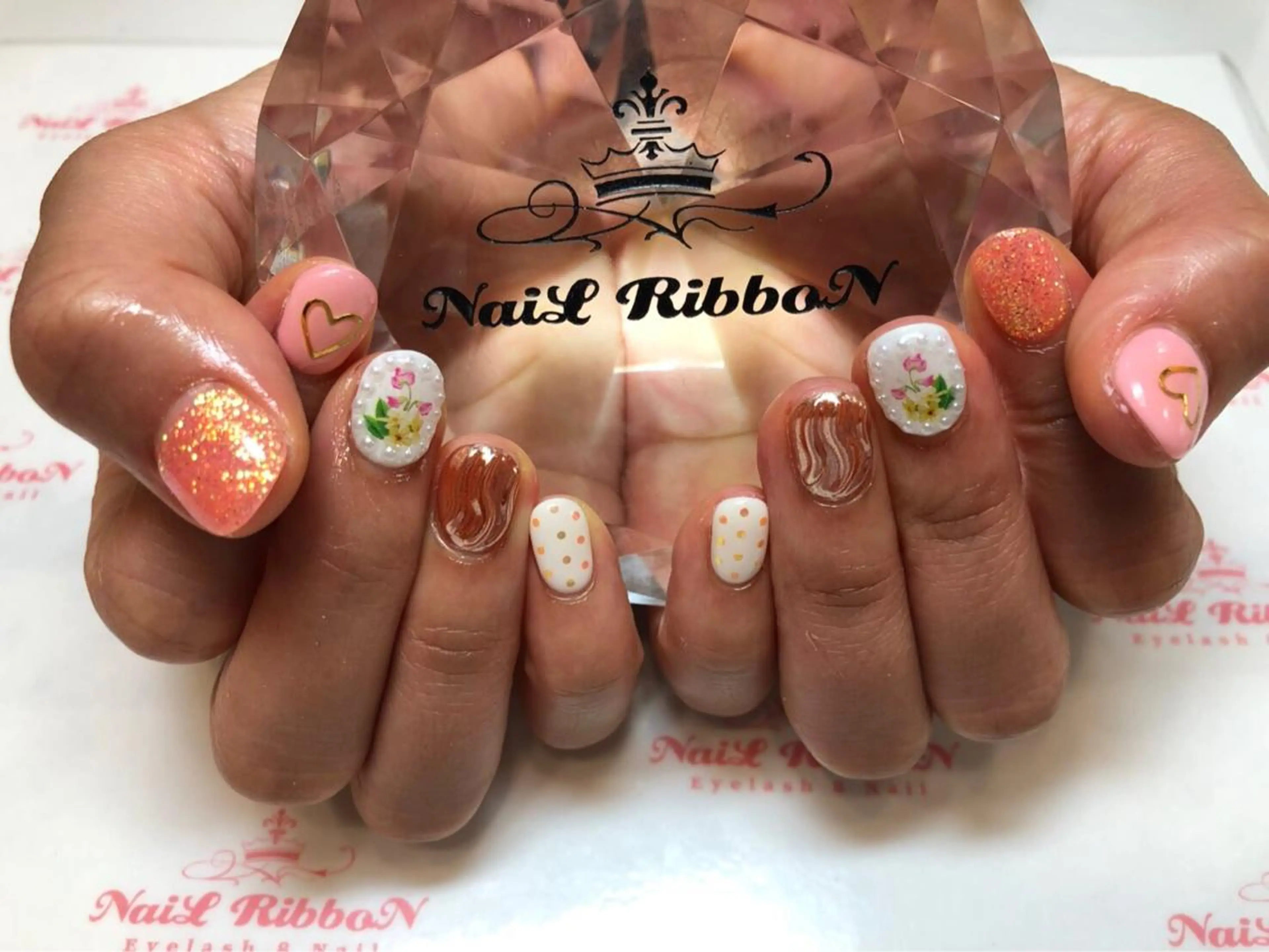 ネイル 春ネイル ネイルリボン 受付スタッフのネイルデザイン