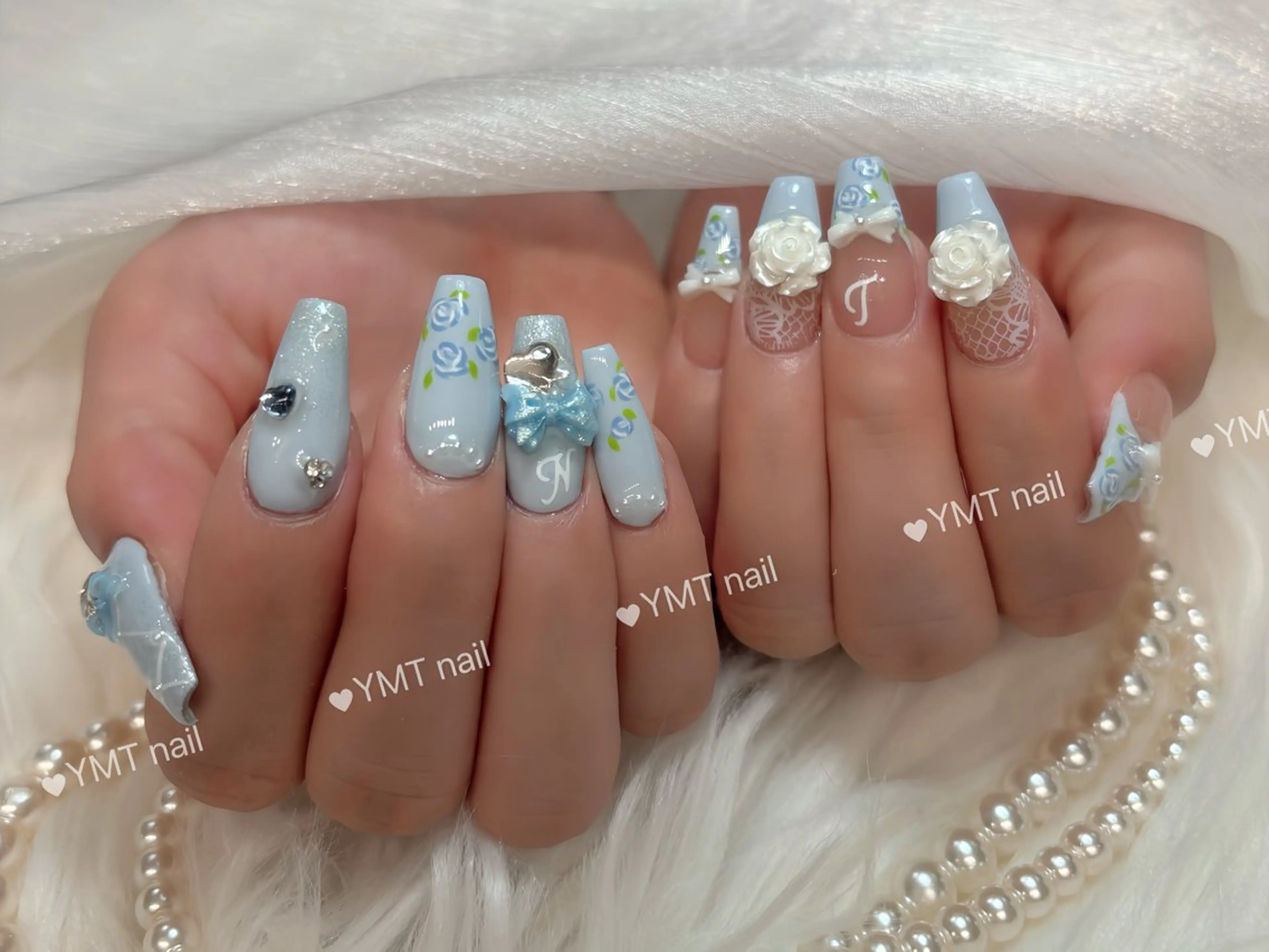 ネイル アートネイル ブルー フラワーネイル ジェルネイル ガーリー ハンドネイル YMT NailStudioのネイルデザイン