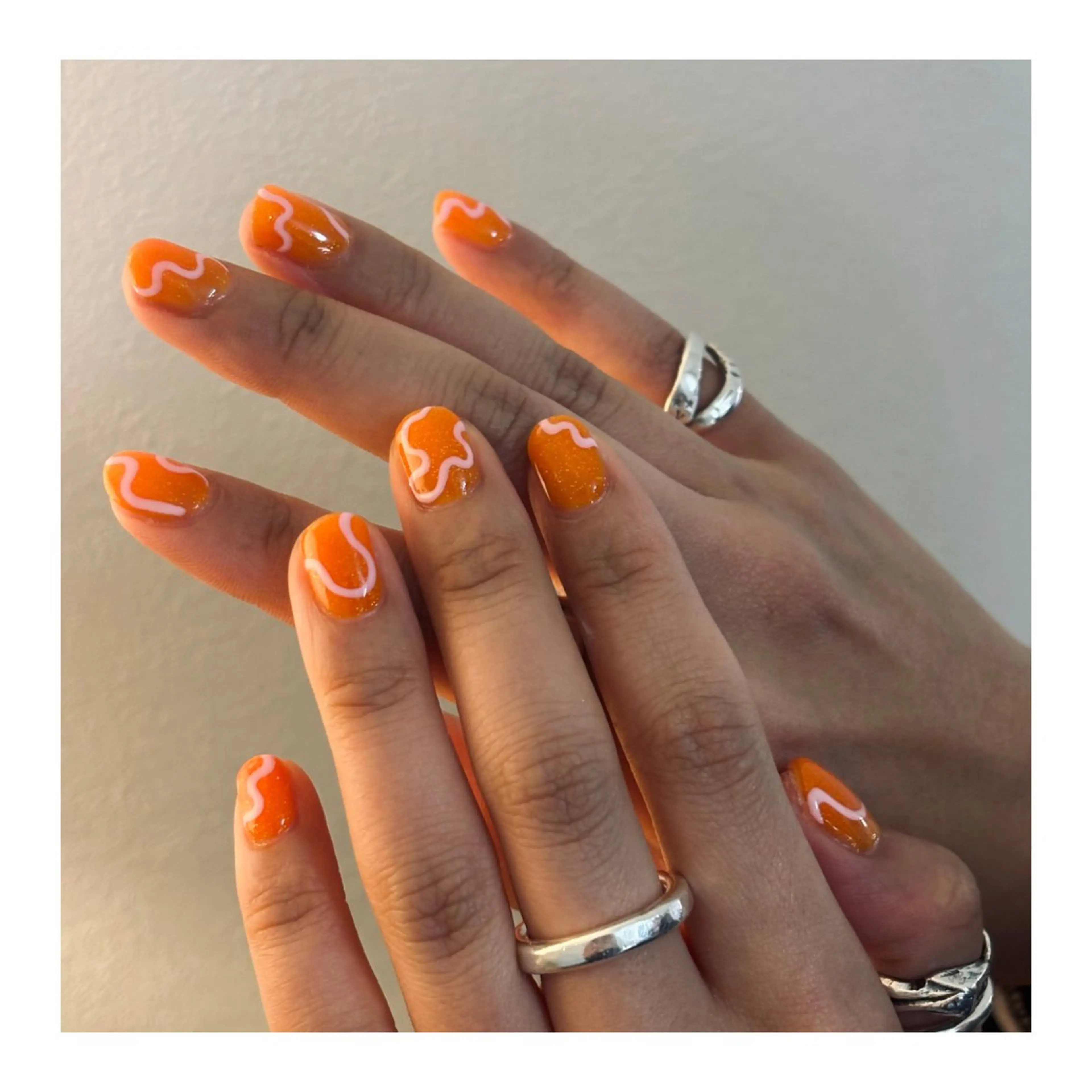 ネイル オレンジ ピンク ハンドネイル Elio 国泰寺のネイルデザイン