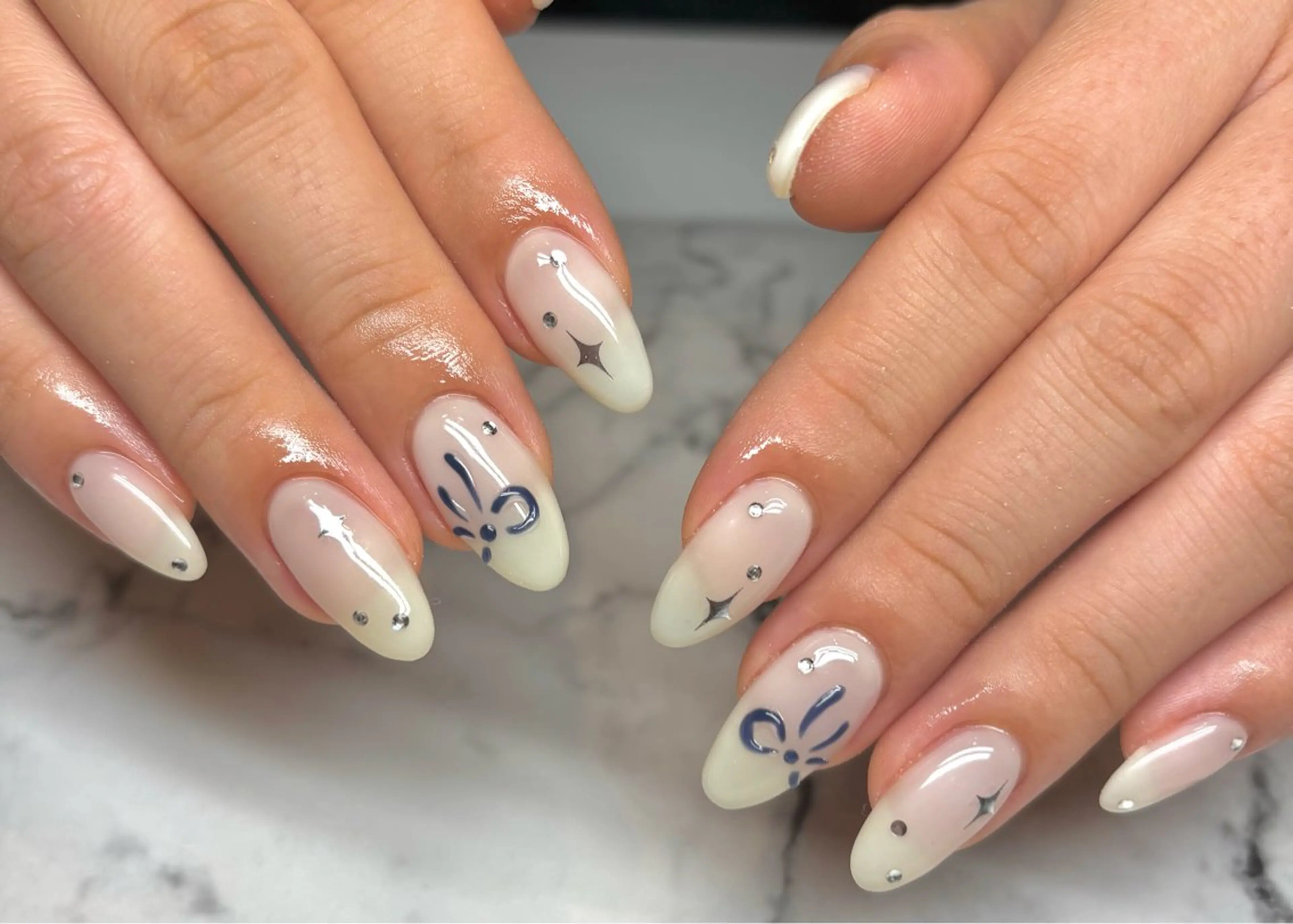 ネイル ハンドネイル 𝒾𝓀𝑜𝒾 *:.｡.☆のネイルデザイン