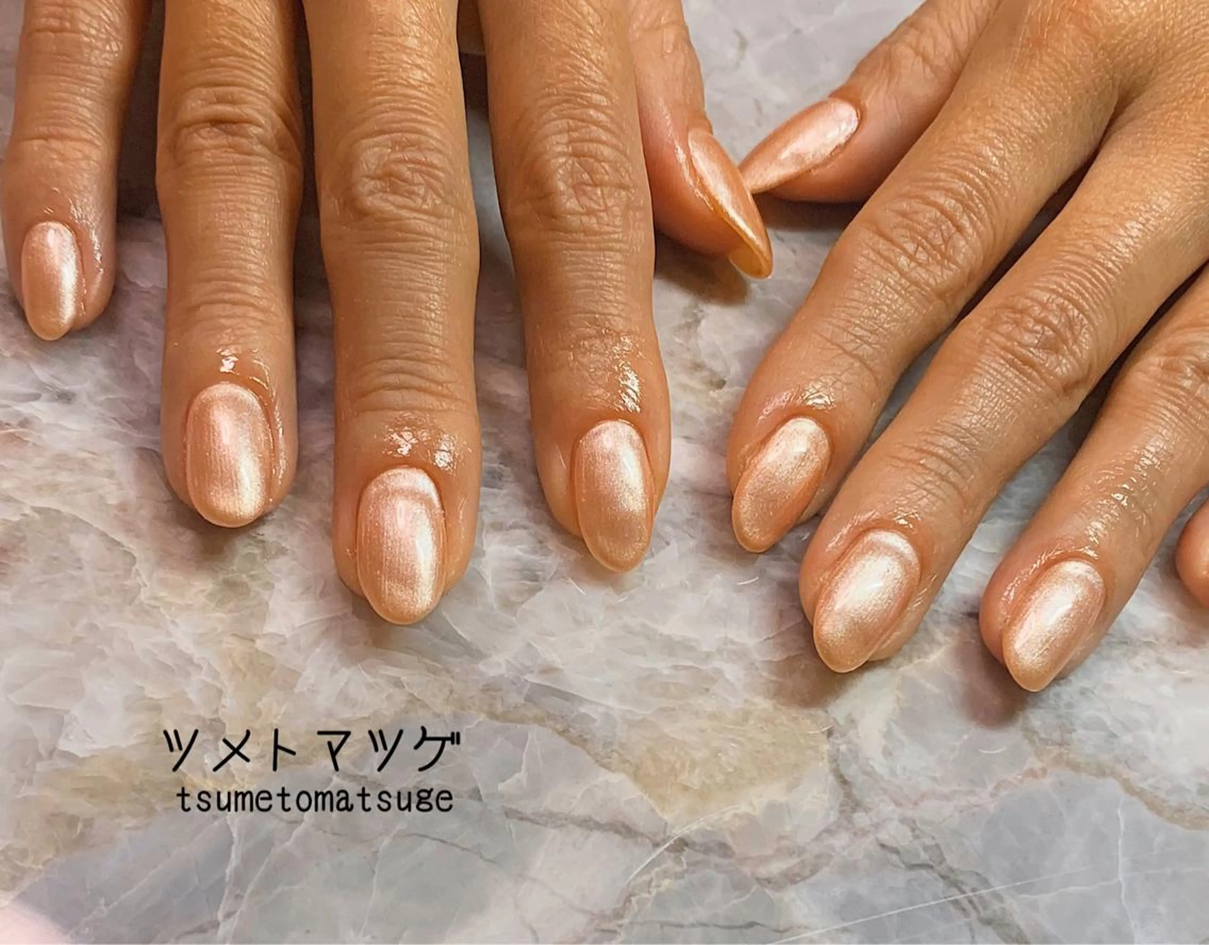 ミディアム ネイル ハンドネイル ツメトマツゲ .のネイルデザイン