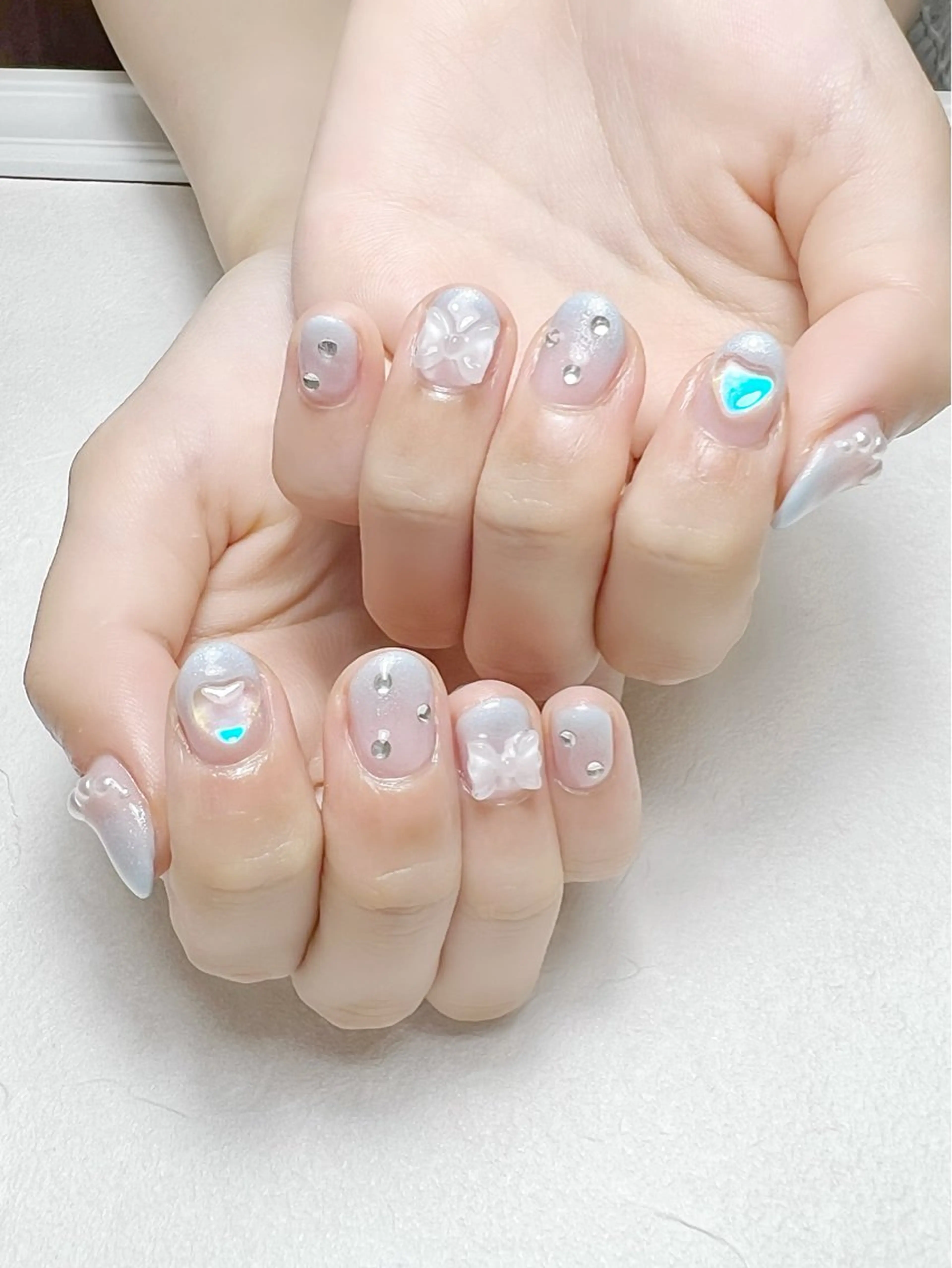 ネイル ブルー グラデーション ラメ(グリッター) ラメグラデーション リボン rouse nail RISATOのネイルデザイン