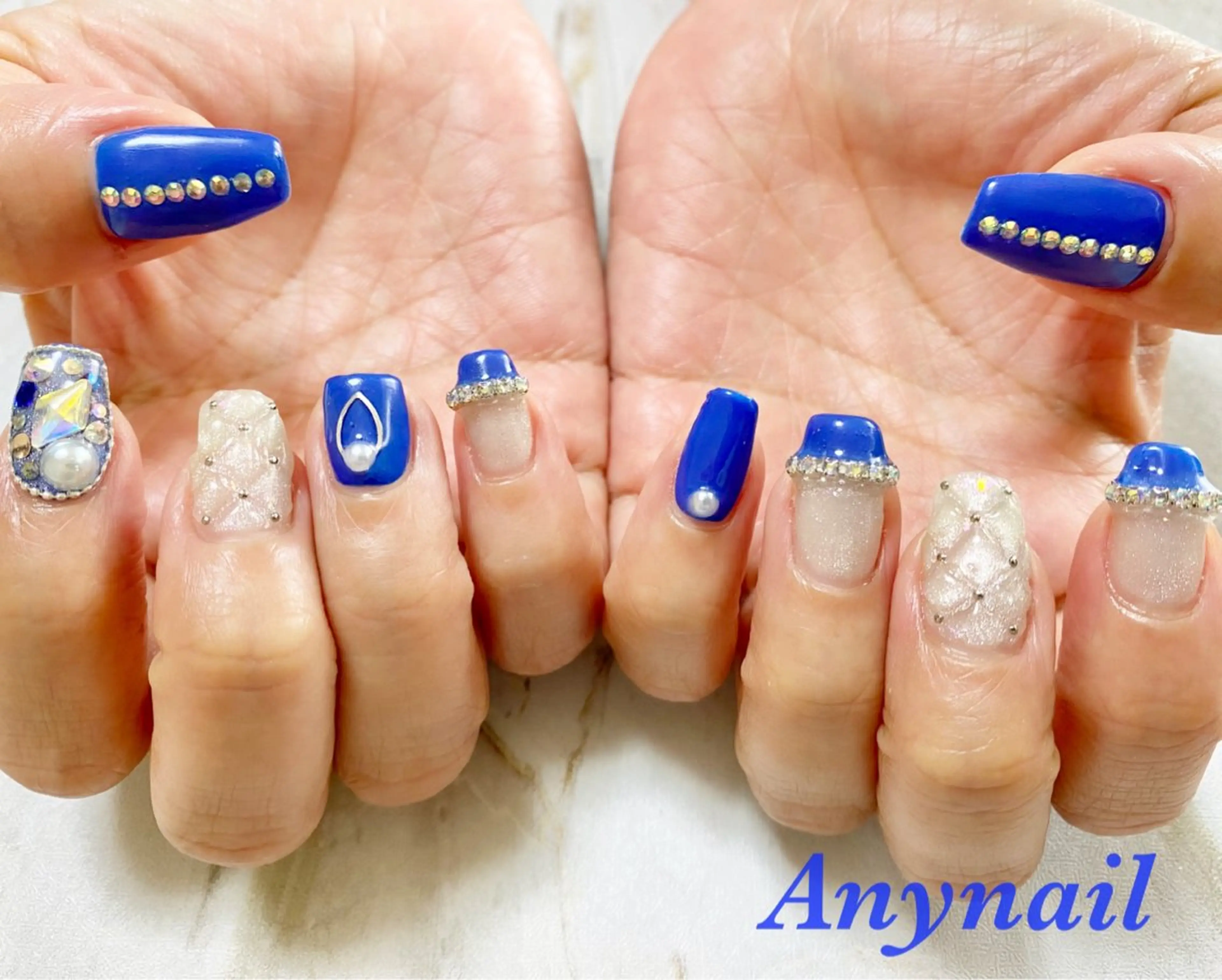 ネイル ブルー キラキラネイル マグネットネイル ブライダルネイル 岩澤 恵子のネイルデザイン