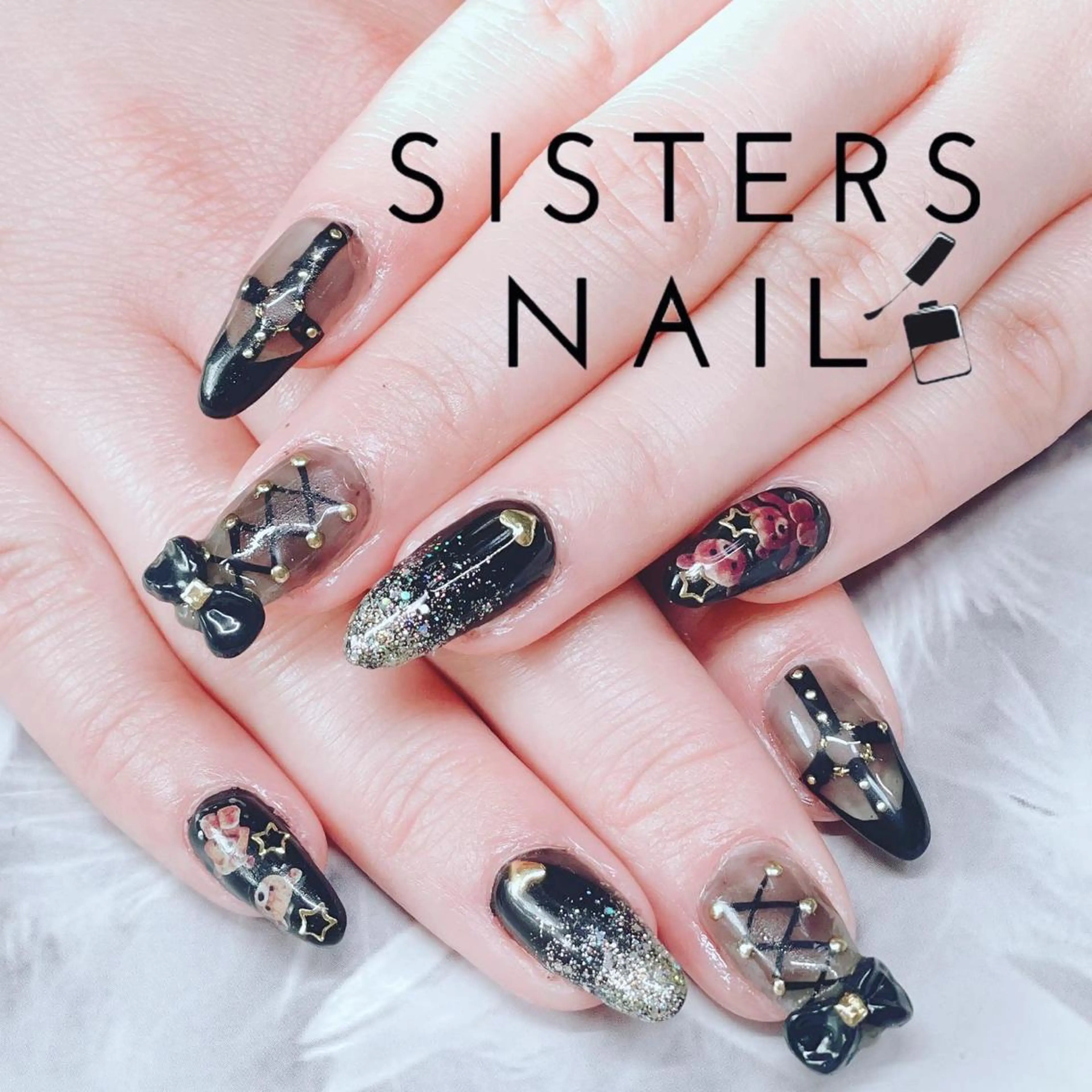 ネイル アートネイル キラキラネイル リボン sisters nail.fのネイルデザイン