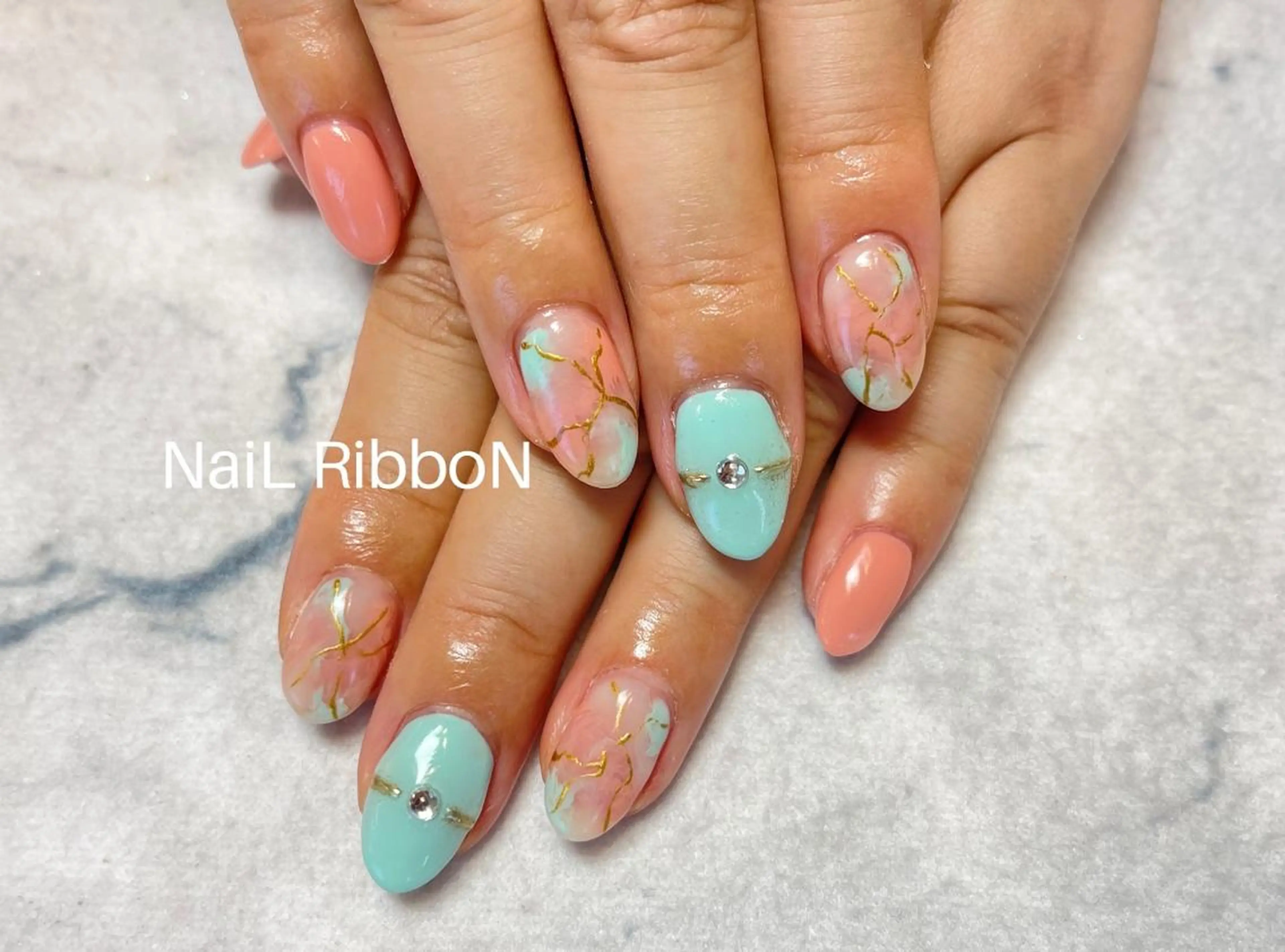 ネイル ネイルリボン 受付スタッフのネイルデザイン