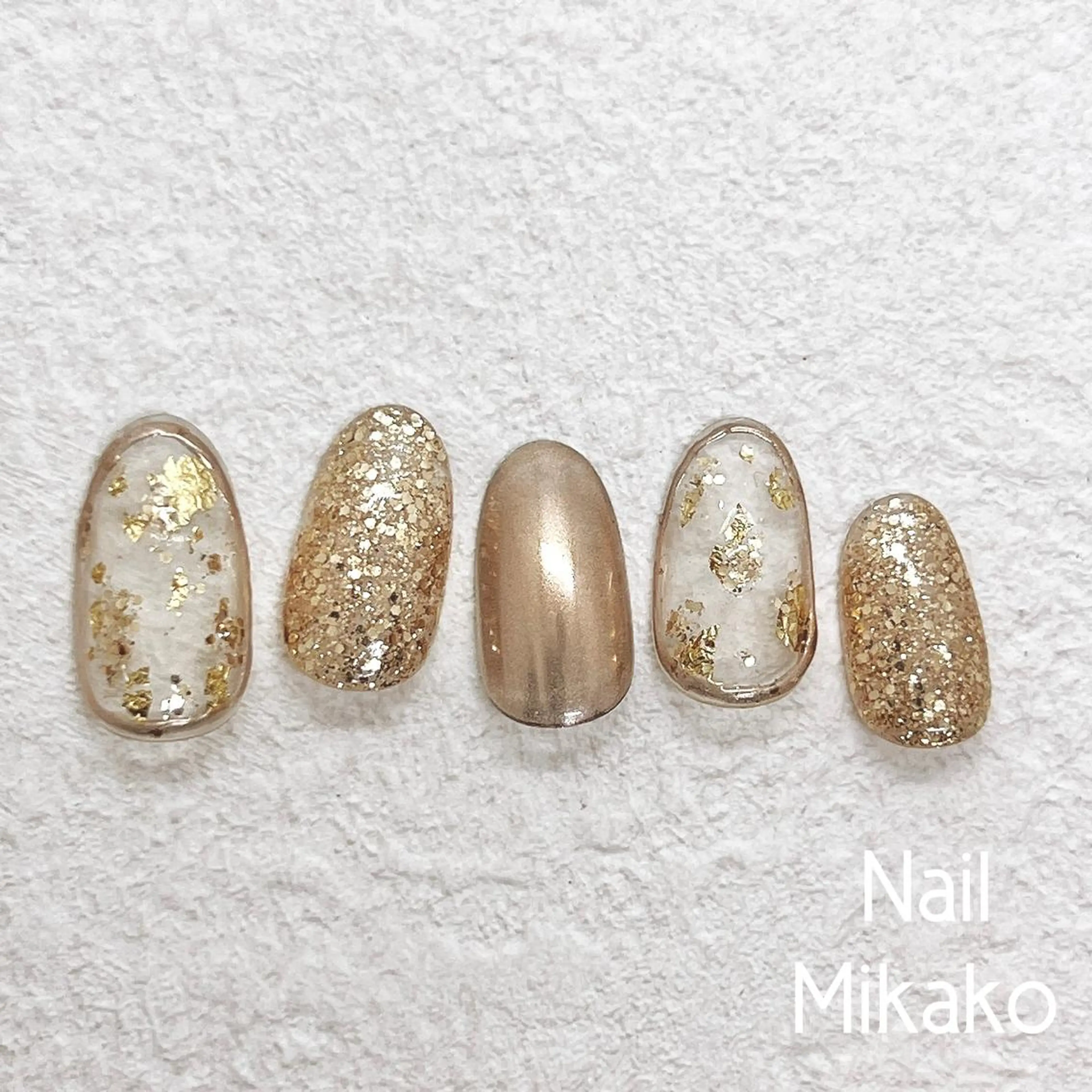 ネイル ゴールド キラキラネイル ラメ(グリッター) ミラーネイル ニュアンスネイル Nail Mikakoのネイルデザイン