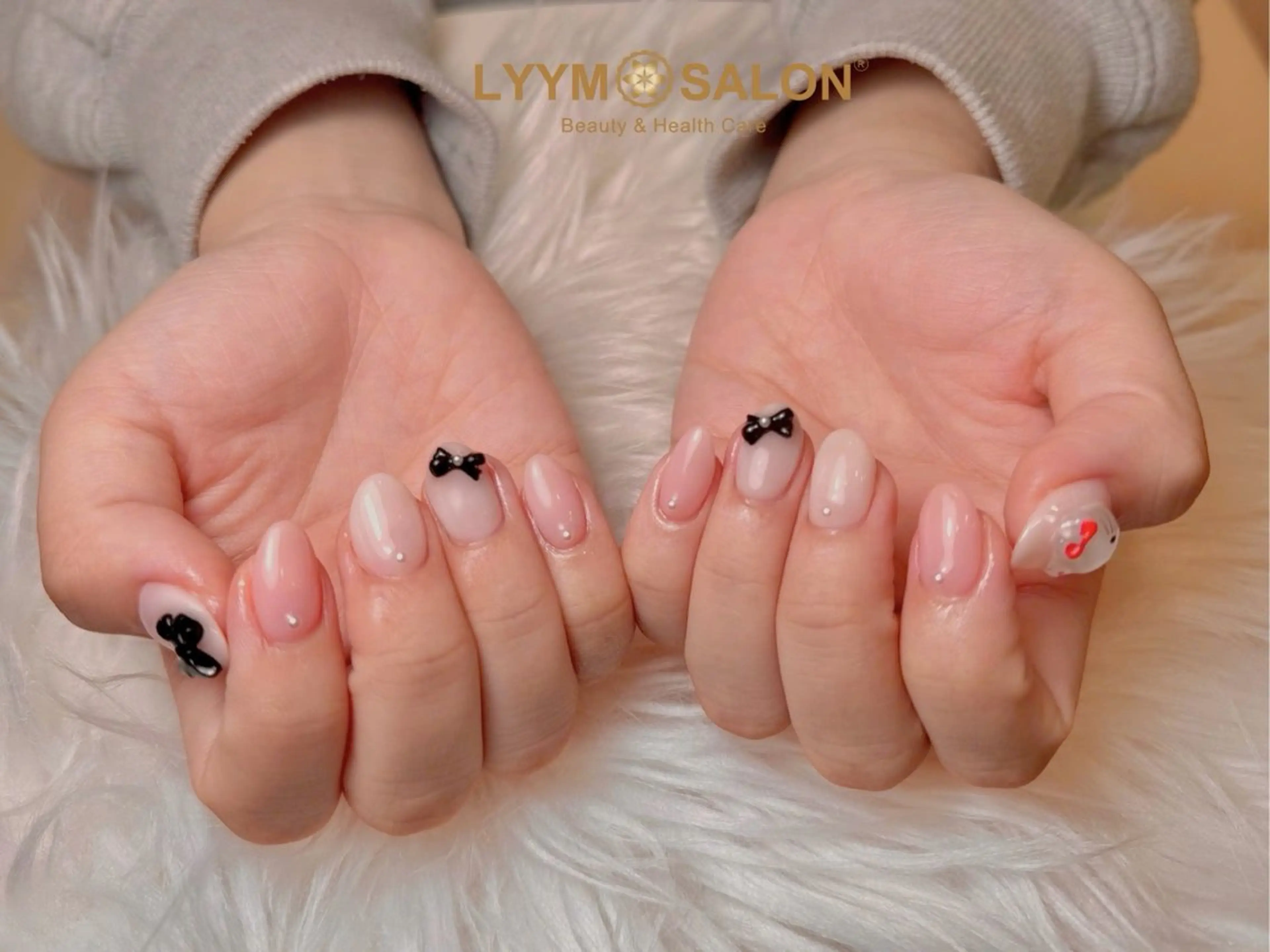 ネイル アートネイル ガーリー 韓国ネイル ピンク リボン ハンドネイル ハンドケア LYYM Salonのネイルデザイン