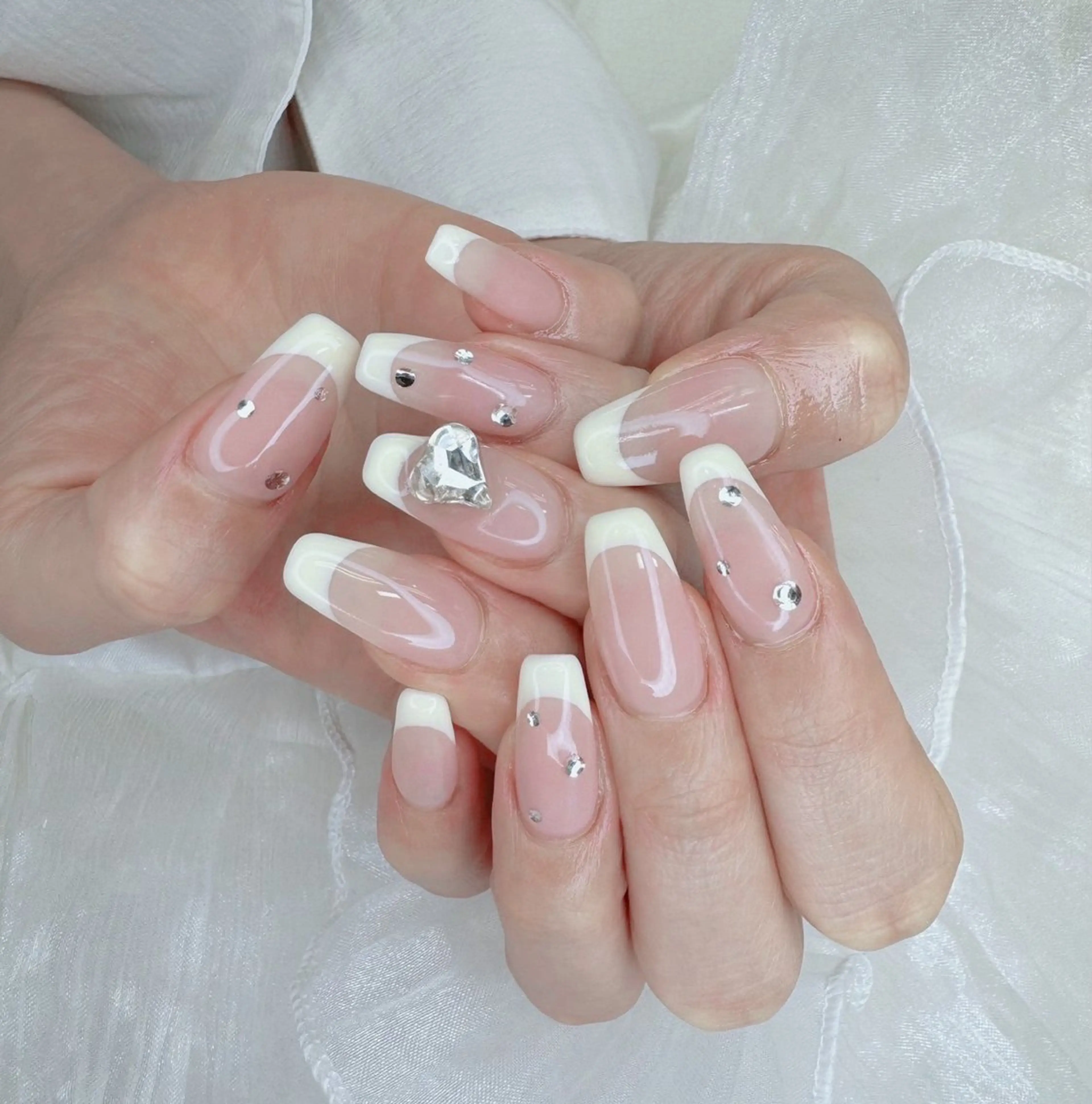 オフ無し✩⋆*フレンチネイル(クリアベース)の写真