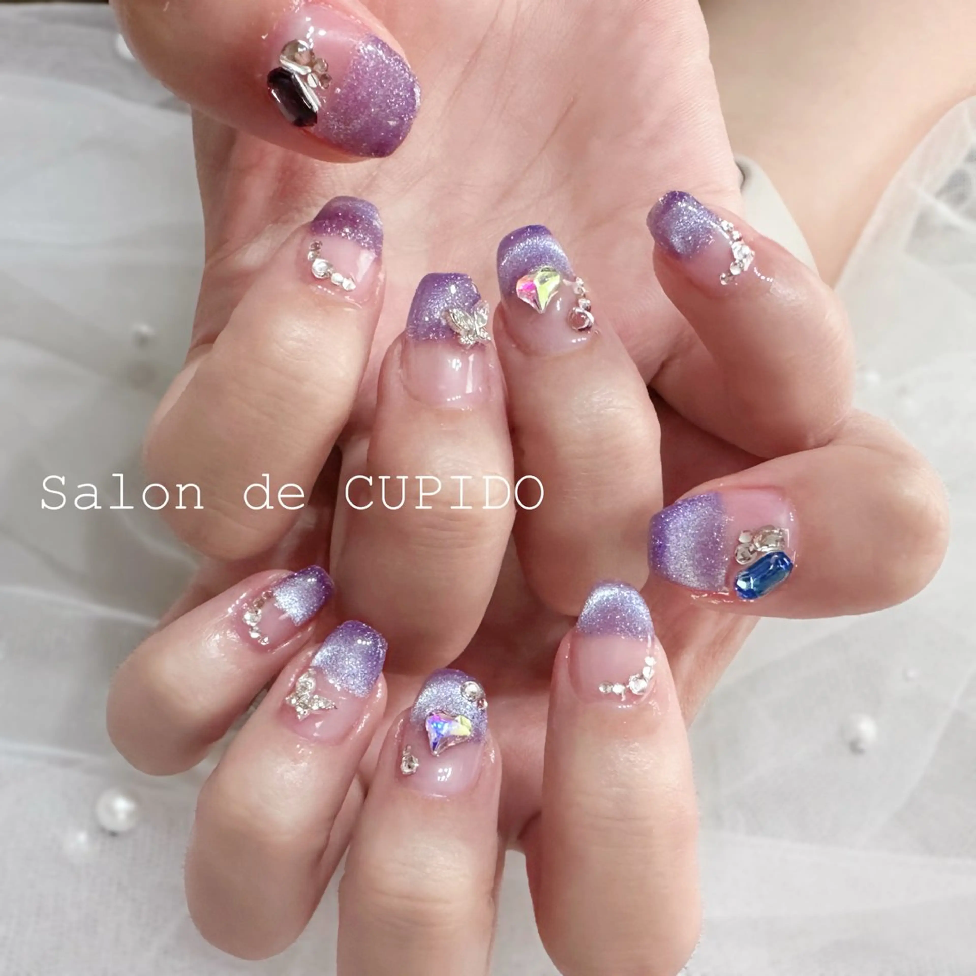 ネイル グラデーション キラキラネイル マグネットネイル パープル Salon de CUPIDOのネイルデザイン