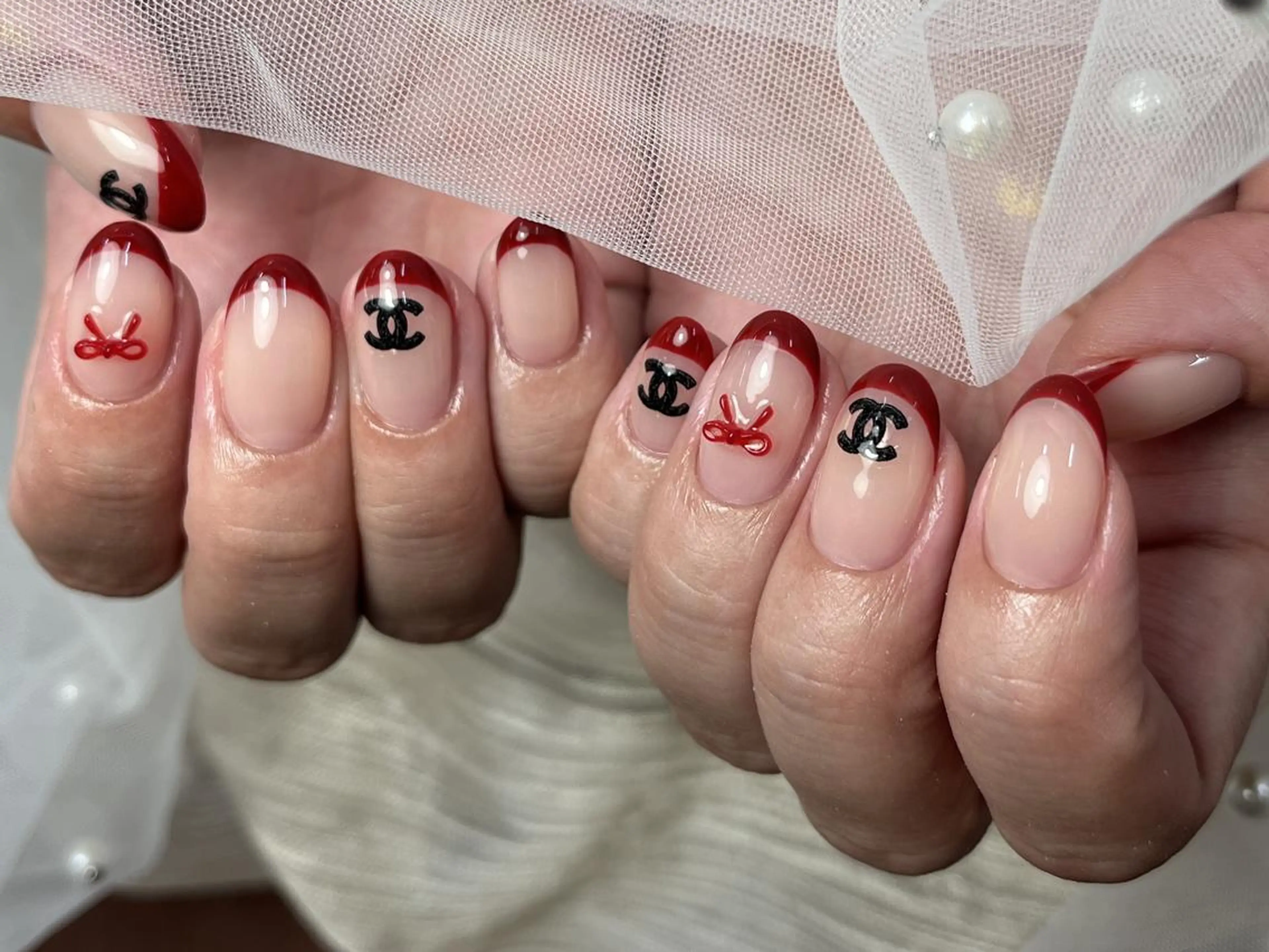 ネイル アートネイル フレンチネイル 赤色 シンプルネイル ハンドネイル ハンドケア ToliyDeliy Nail Salonのネイルデザイン