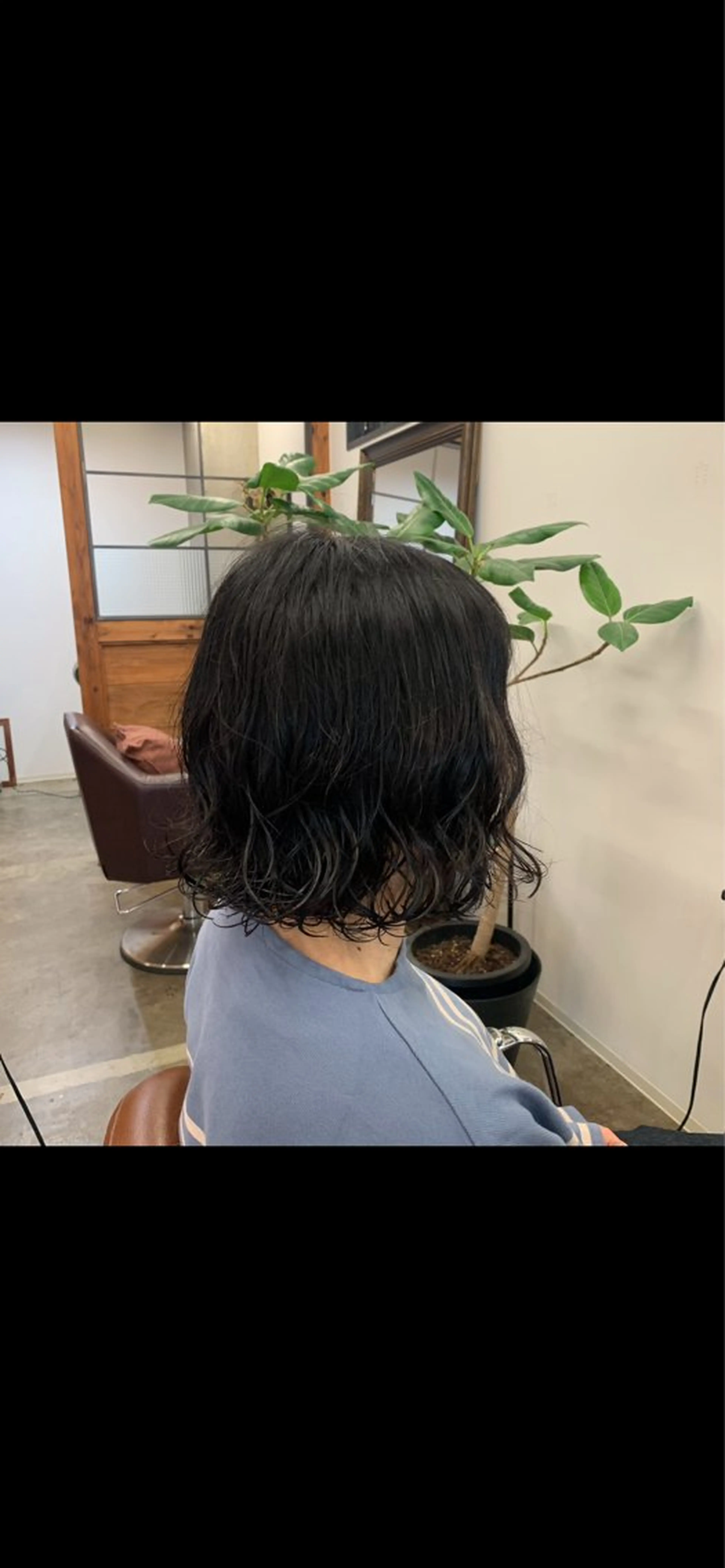 パーマ コウノス マサコのヘアスタイル