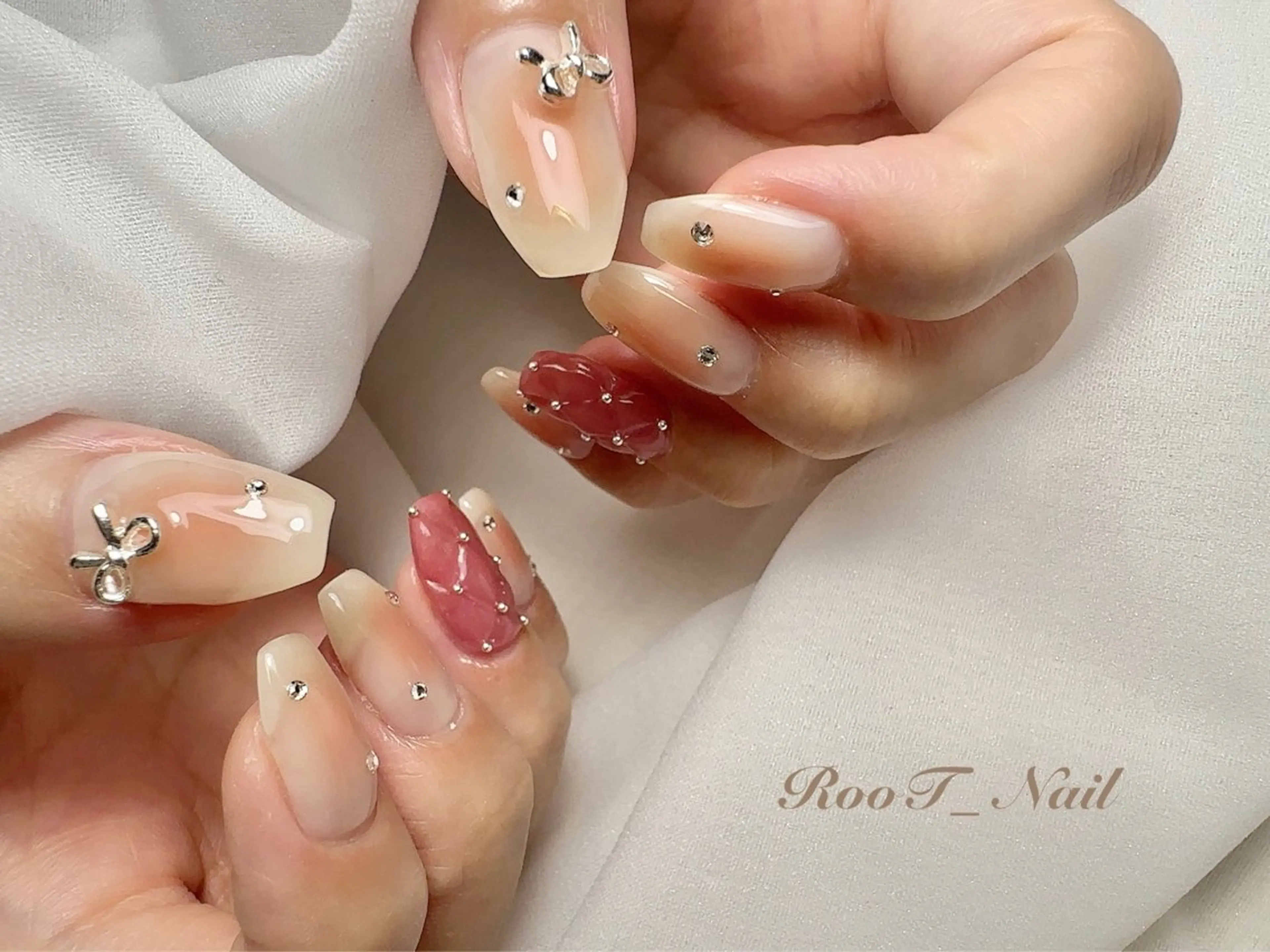 ネイル チークネイル リボン ハンドネイル RooT Nailのネイルデザイン