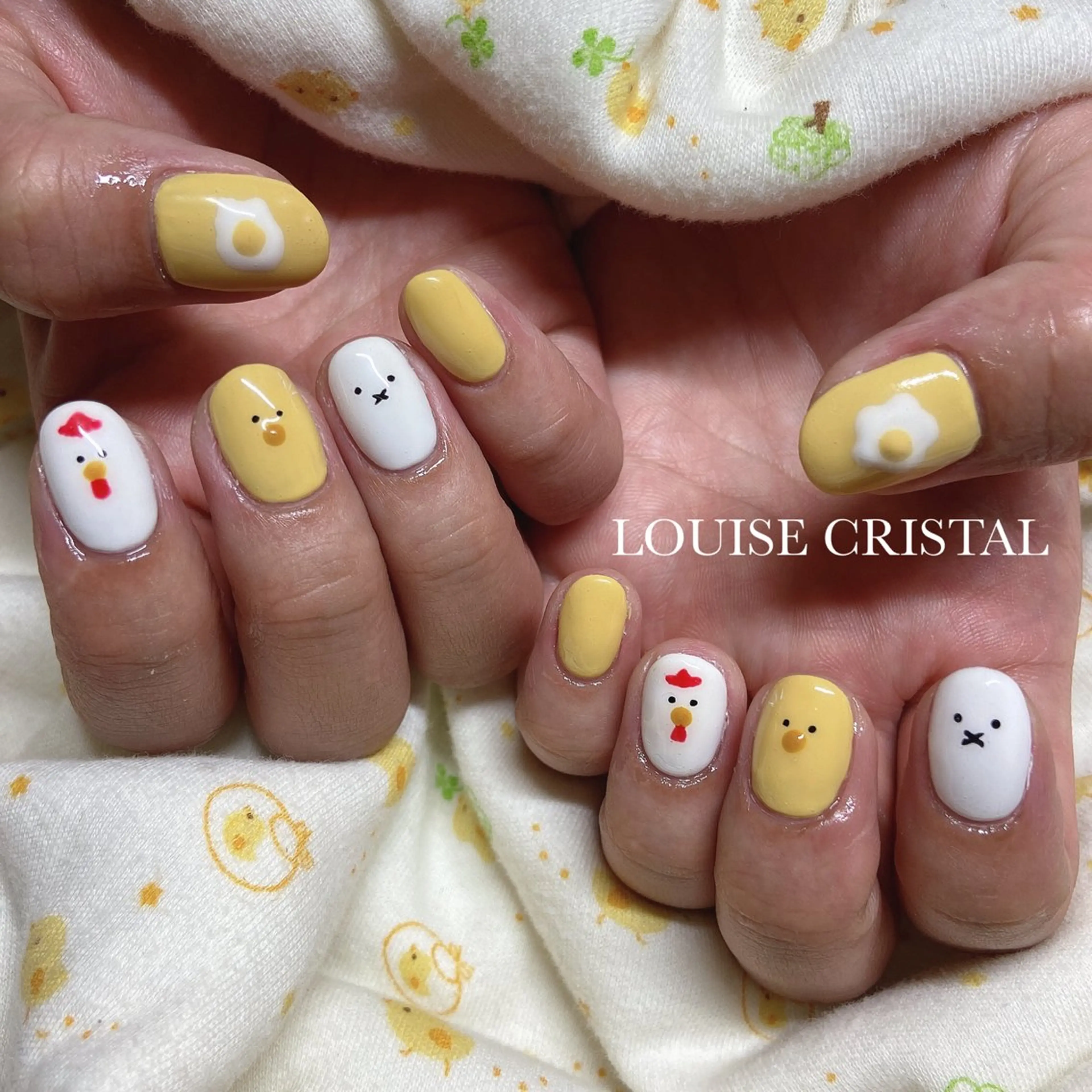 ネイル ハンドネイル LOUISE CRYSTALのネイルデザイン