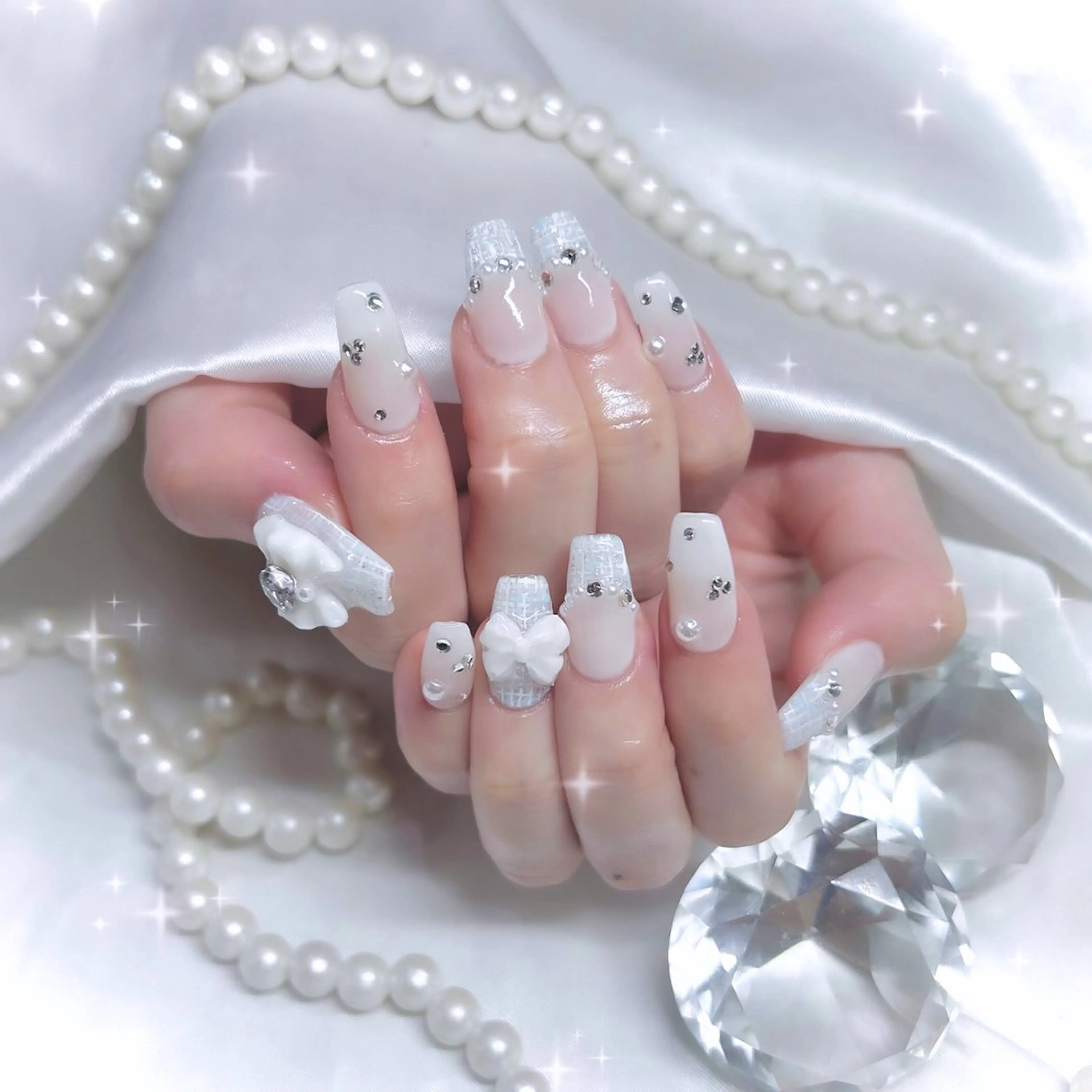 ネイル アートネイル ブルー リボン ツイードネイル 冬ネイル élu by Noriko 前原のネイルデザイン