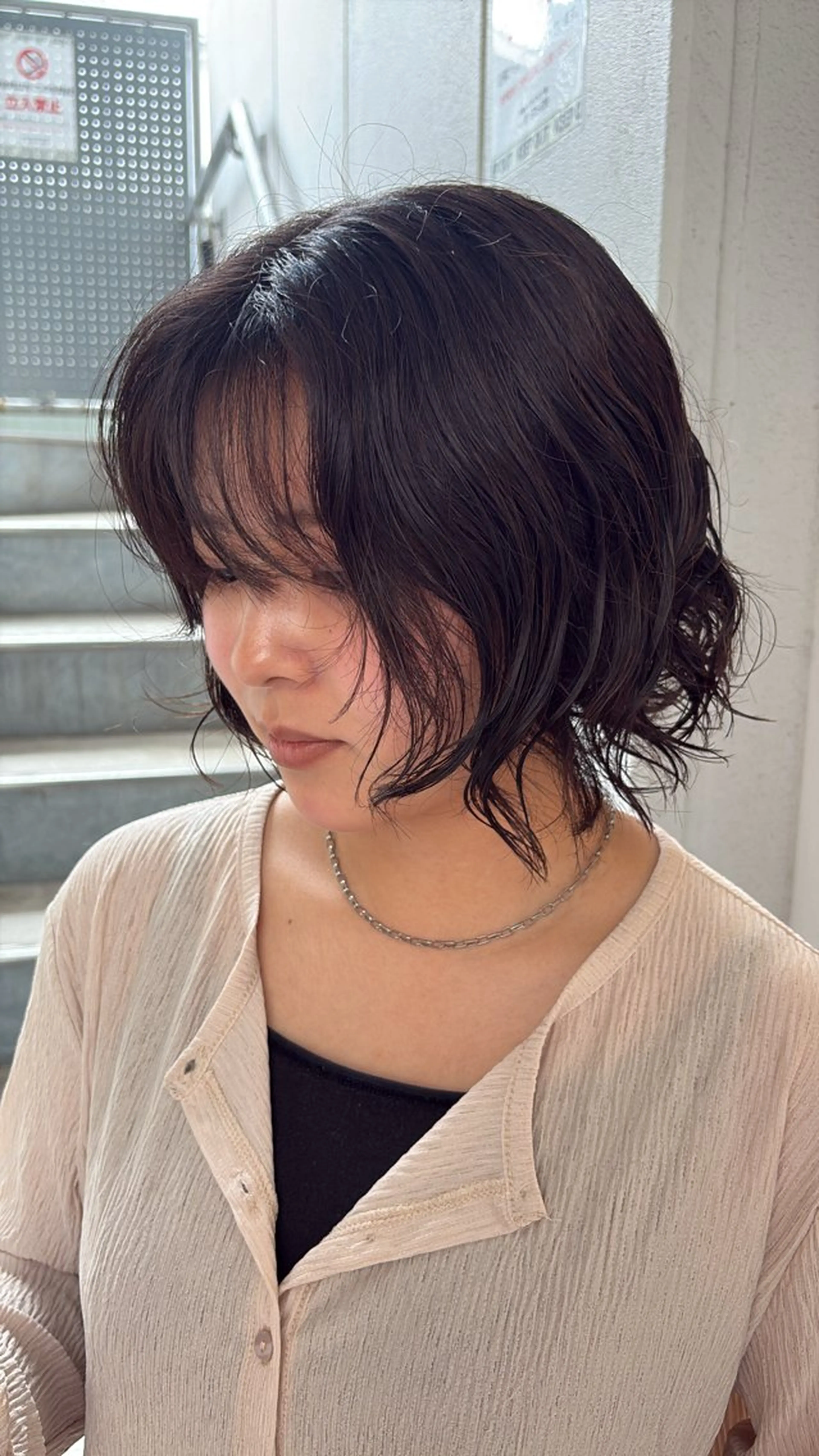パーマ ボブ 桃崎 晏地のヘアスタイル