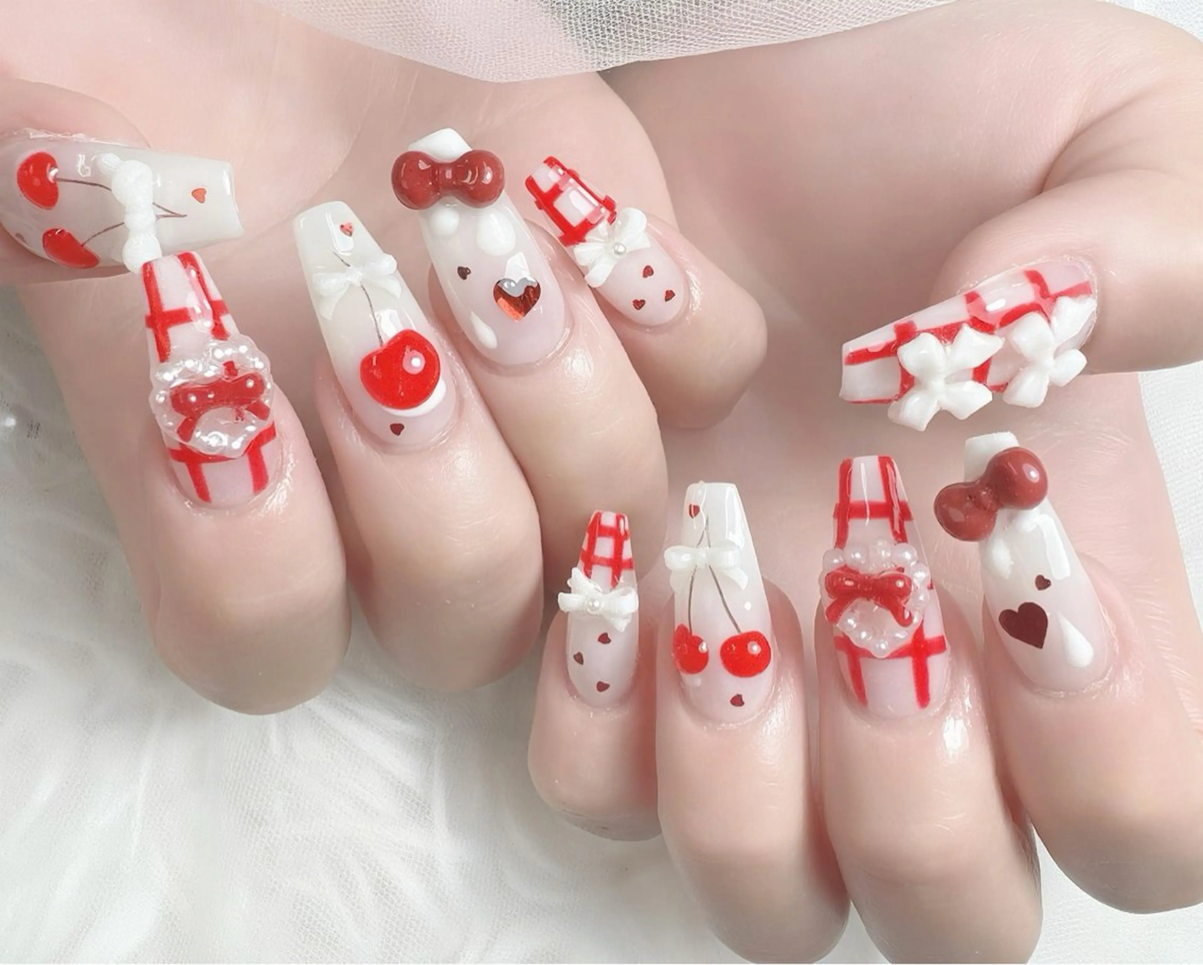 ネイル リボン 春ネイル ハンドネイル ハンドケア Gote Kawa nail salonのネイルデザイン