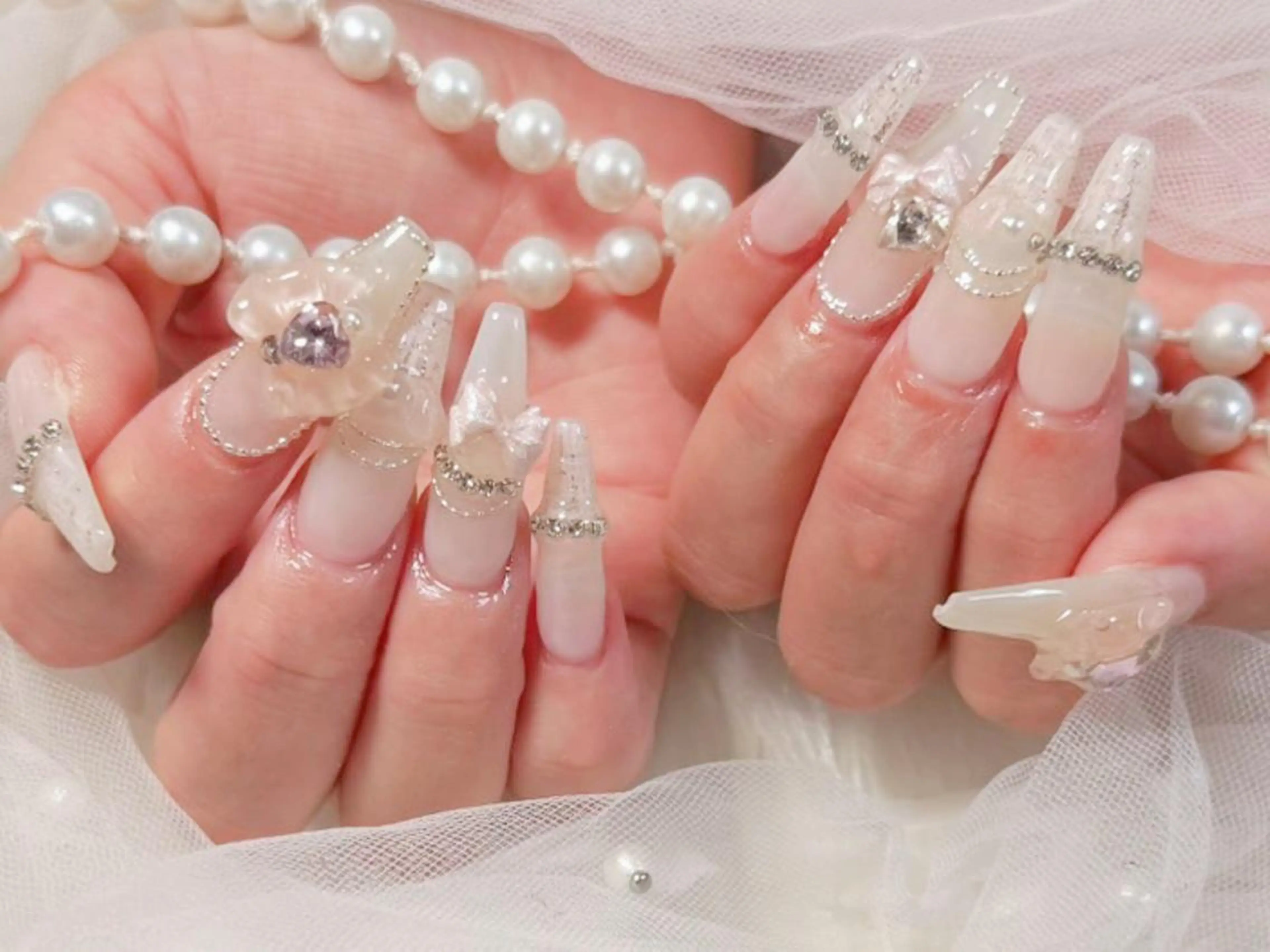 セミロング 韓国風ヘア ハンドネイル Hanaai Salon新大久保店のネイルデザイン