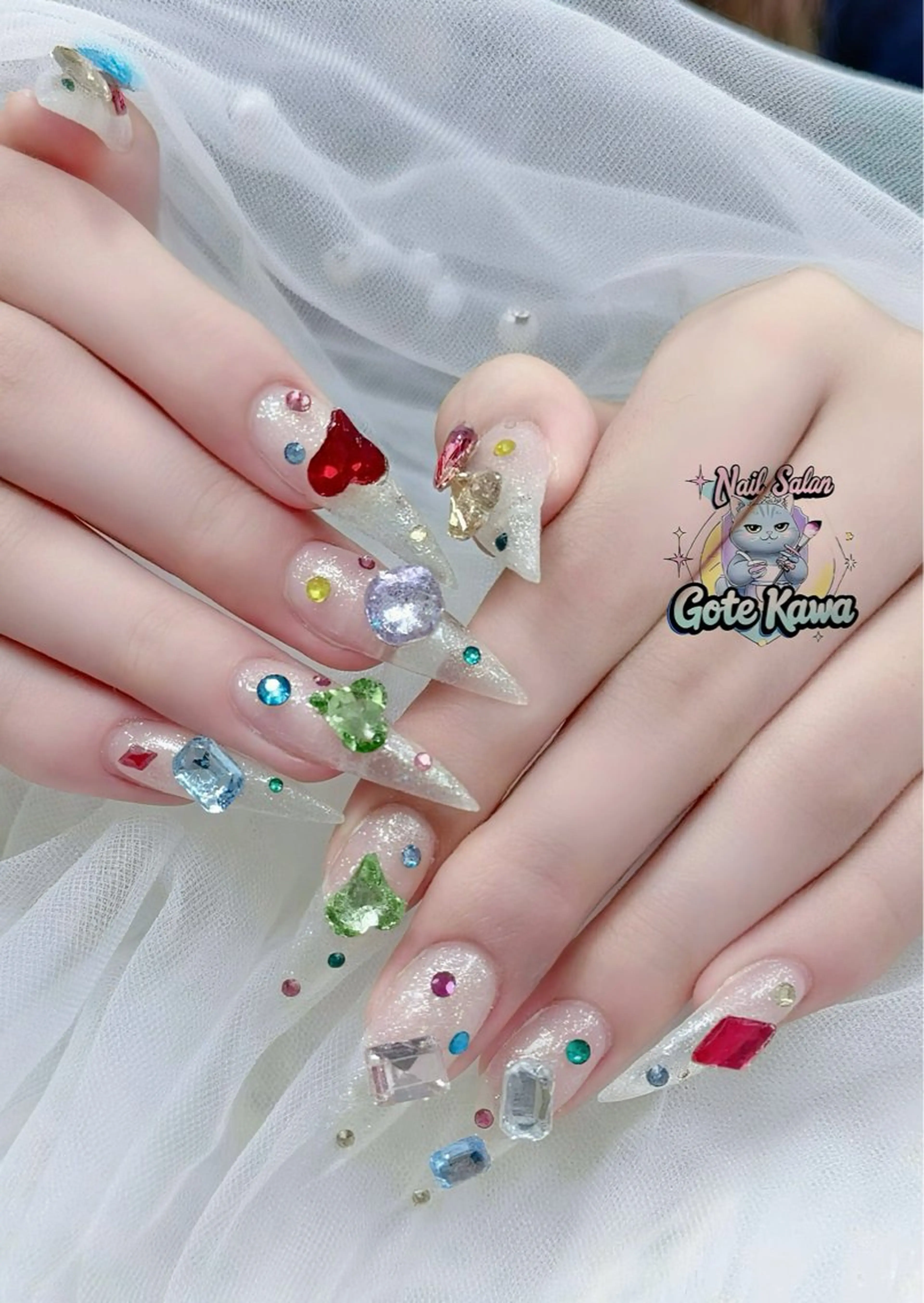ネイル アートネイル 長さ出し キラキラネイル ピンク リボン ハンドネイル ハンドケア Gote Kawa nail salonのネイルデザイン
