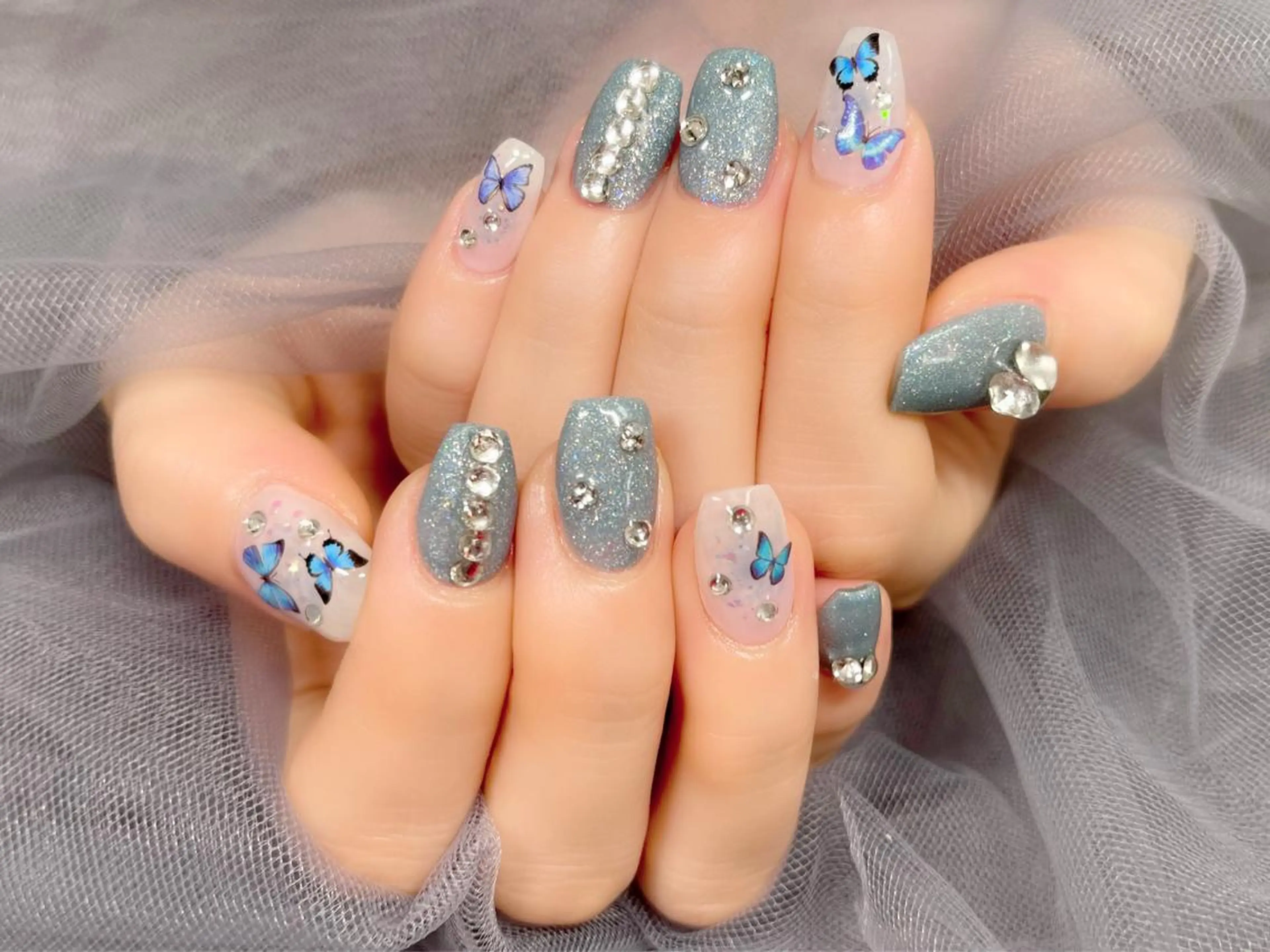 ネイル キラキラネイル 水色 ハンドネイル Nail Salon KURELLYのネイルデザイン