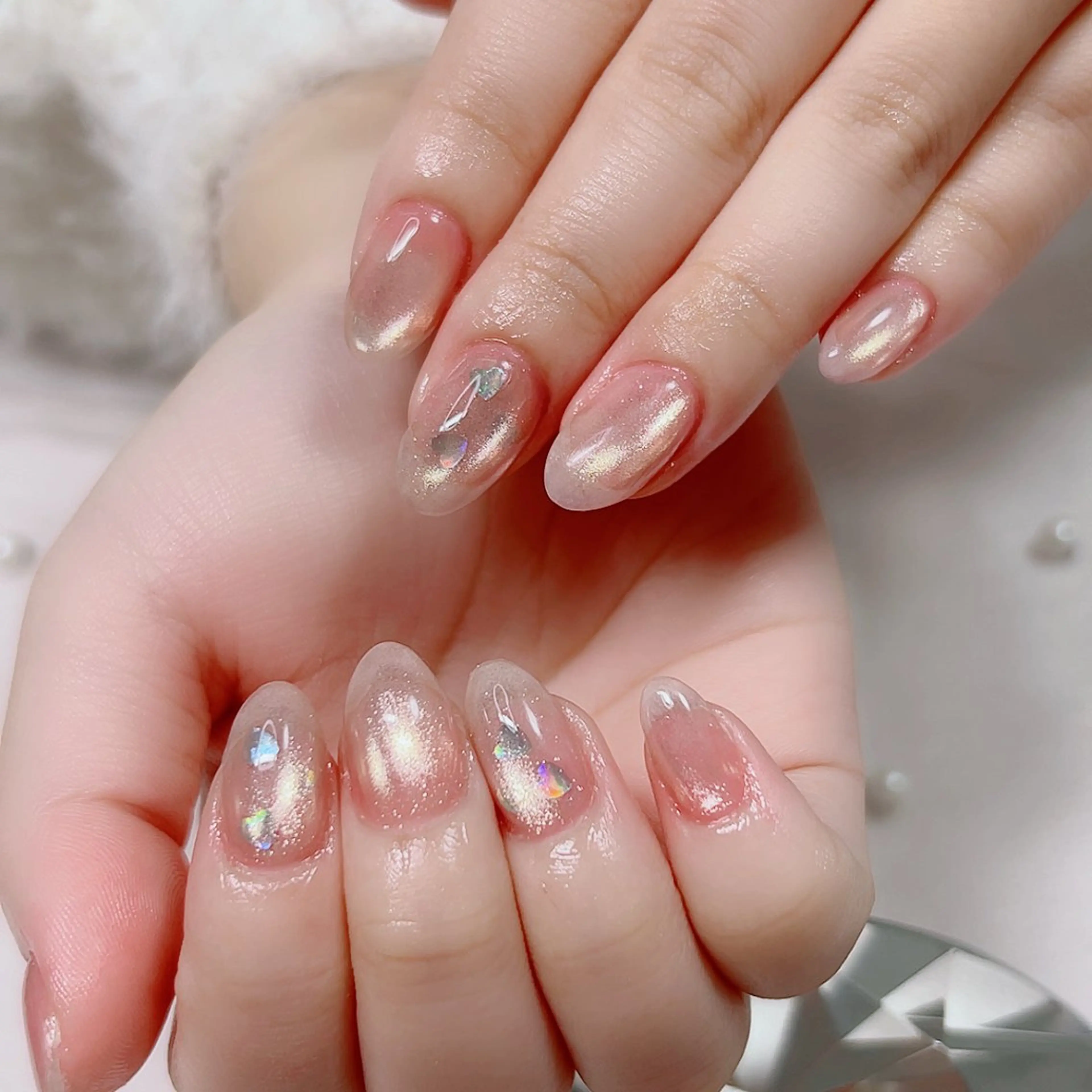 ネイル ハート ホログラムネイル マグネットネイル 春ネイル Cute Tips nailのネイルデザイン