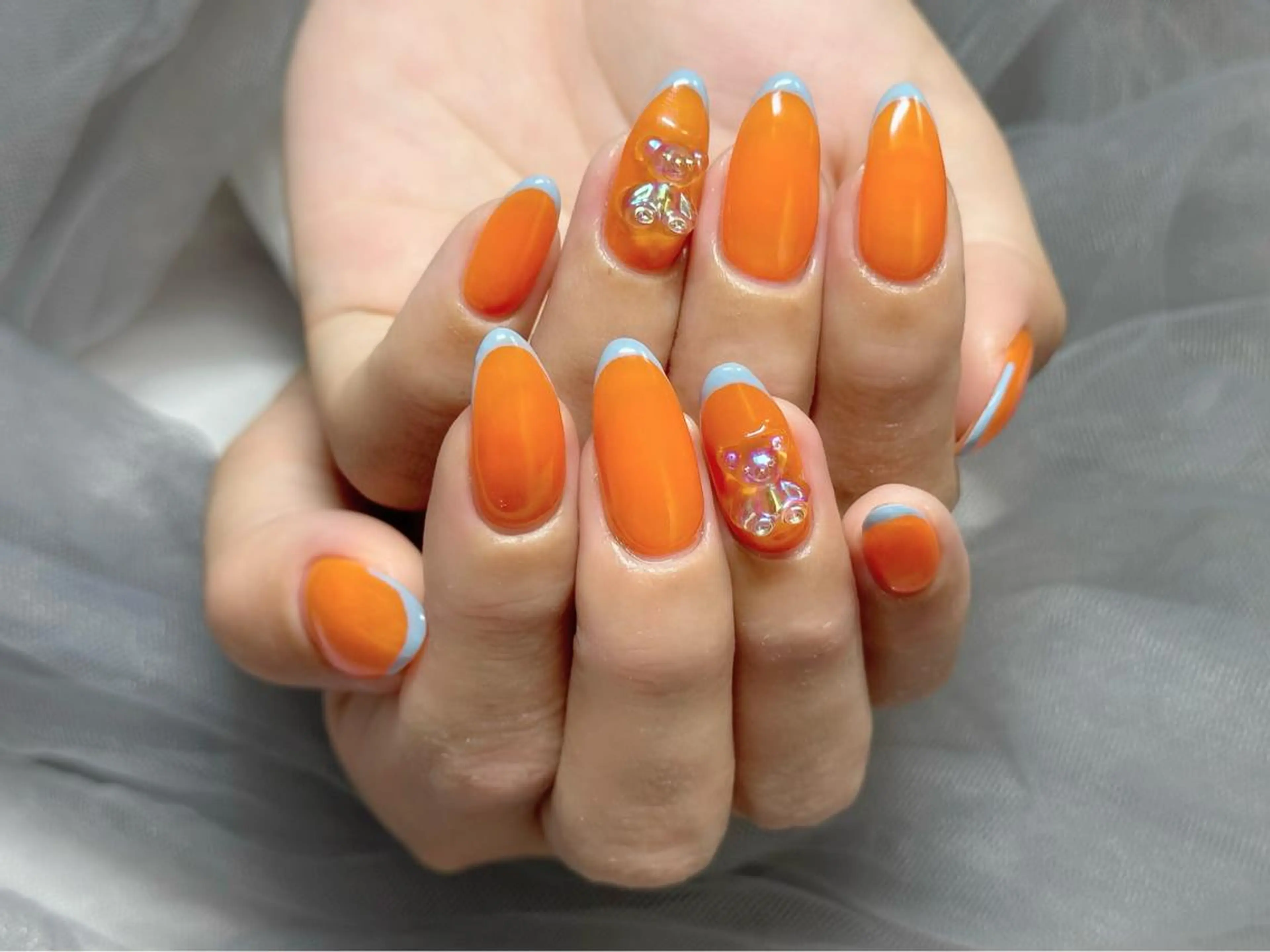 ネイル フレンチネイル 水色 オレンジ ハンドネイル Nail Salon KURELLYのネイルデザイン